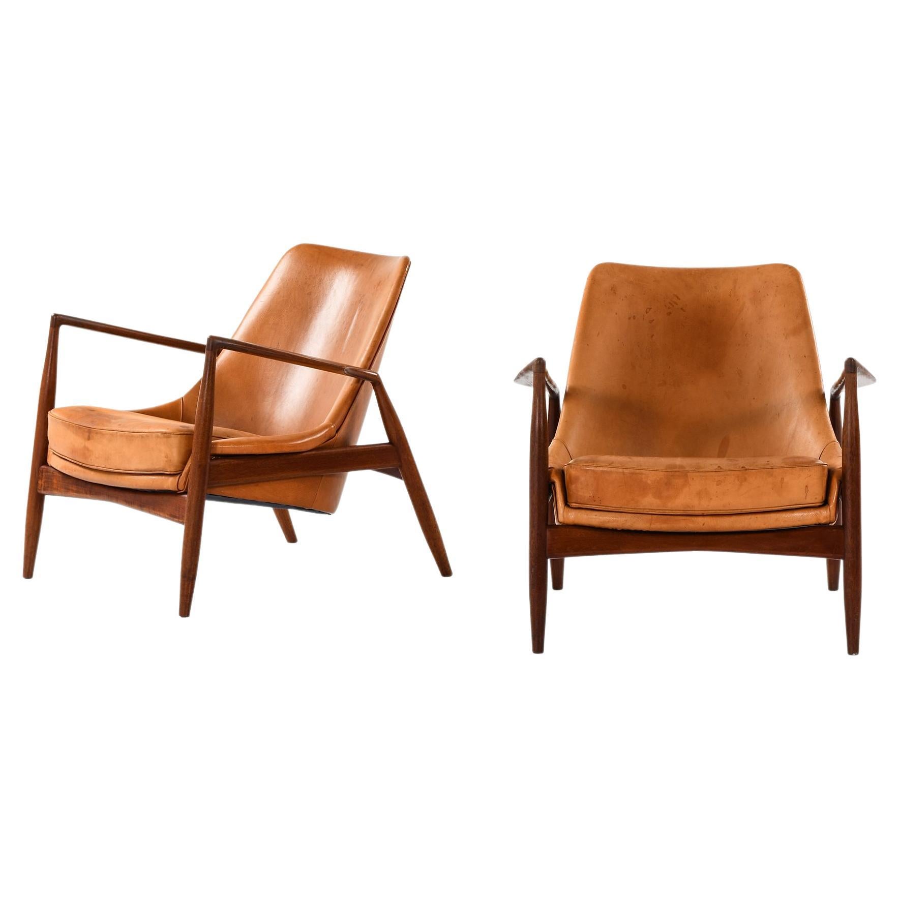 Pair of Easy Chairs in Teak and Leather by Ib Kofod-Larsen, 1950s For Sale