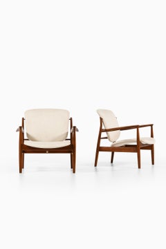 Pair of Easy Chairs in Teak and Newly Reupholstered by Finn Juhl, 1956