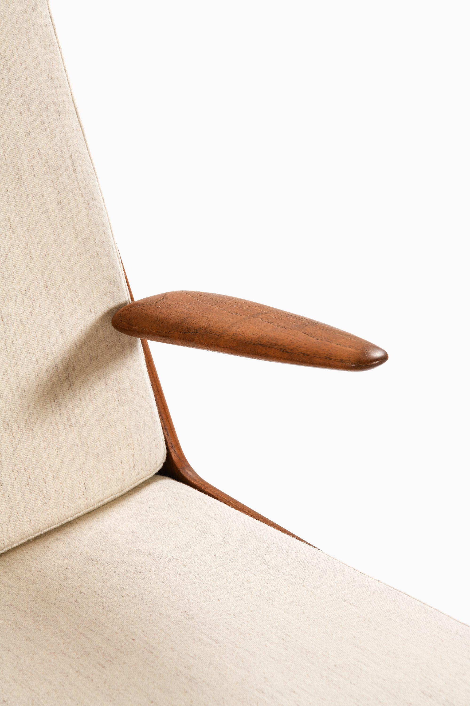 Teck Paire de fauteuils en teck par Peter Hvidt & Orla Mølgaard-Nielsen, années 1950 en vente