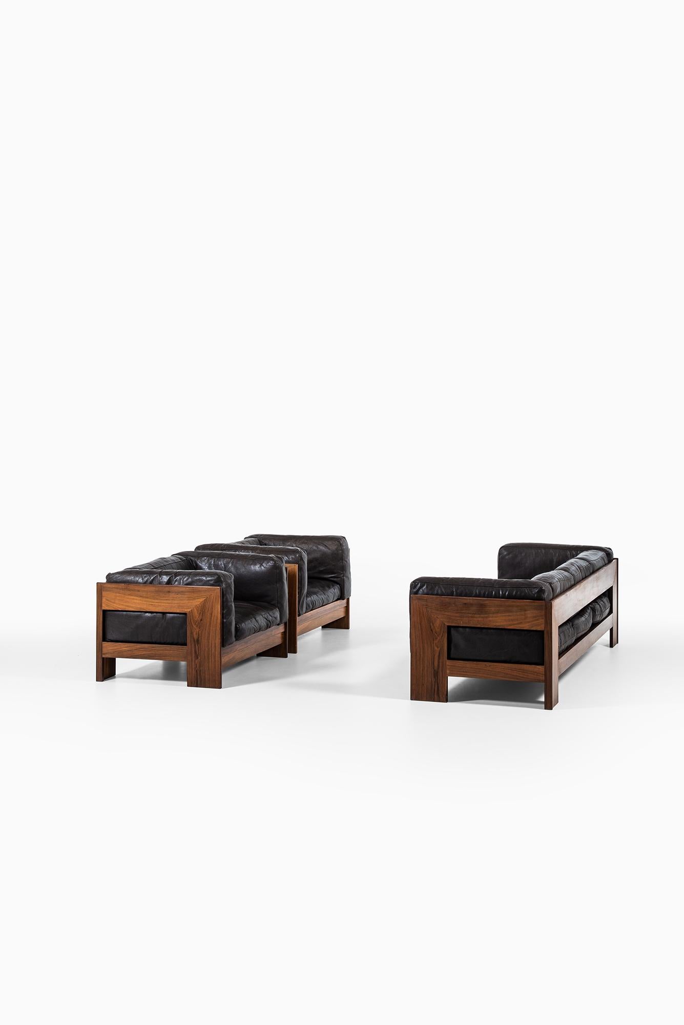 Pair of Easy Chairs in the Manner of Tobia Scarpa in Rosewood and Leather 3