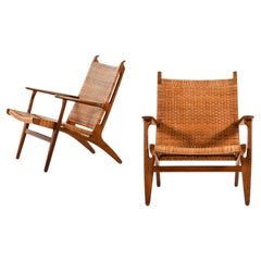 Paire de fauteuils modèle CH-27 en chêne, canne tissée par Hans Wegner, 1949