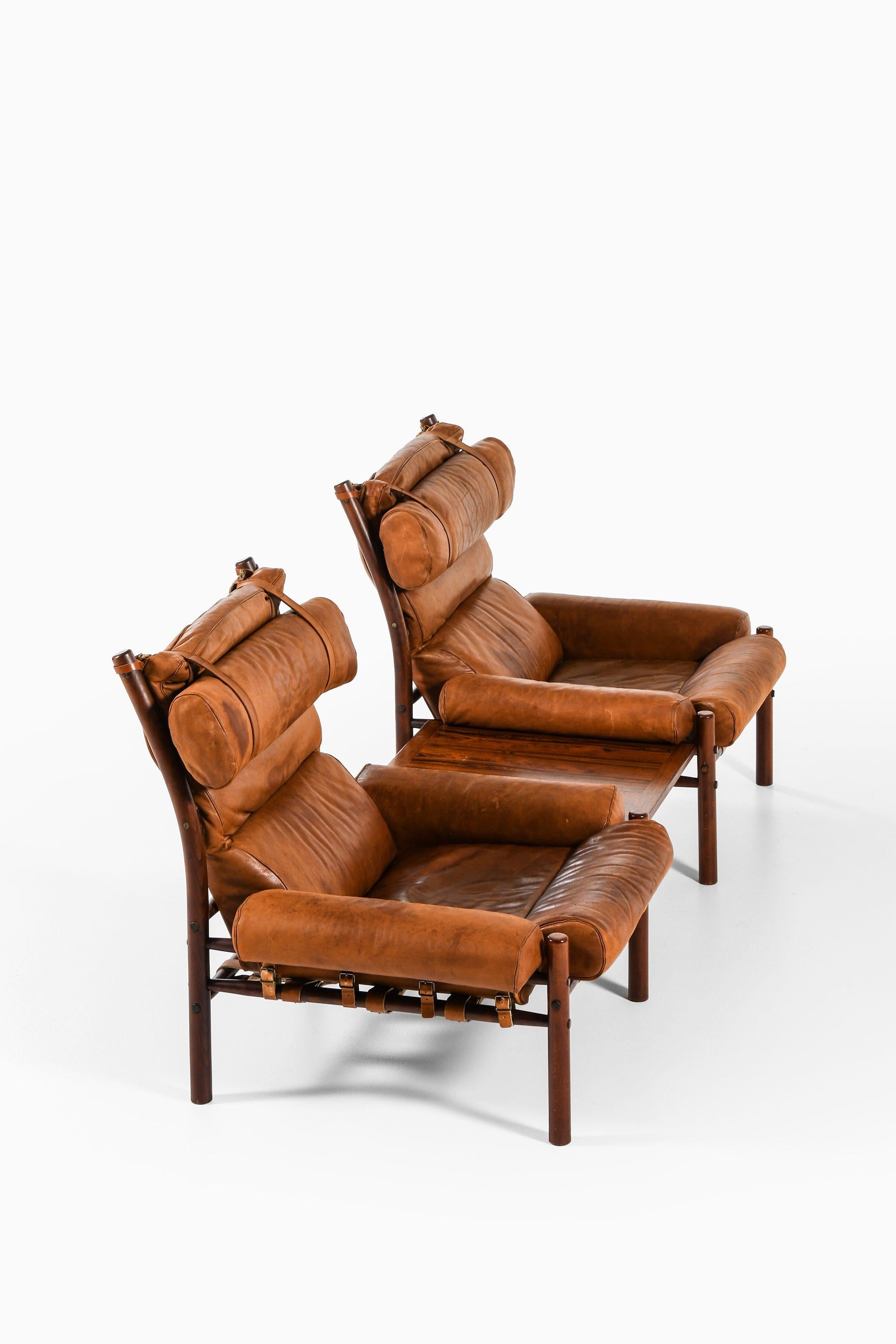 Sessel ohne Armlehne mit Beistelltisch aus Buche und Leder von Arne Norell, 1960er Jahre, Paar (Skandinavische Moderne) im Angebot