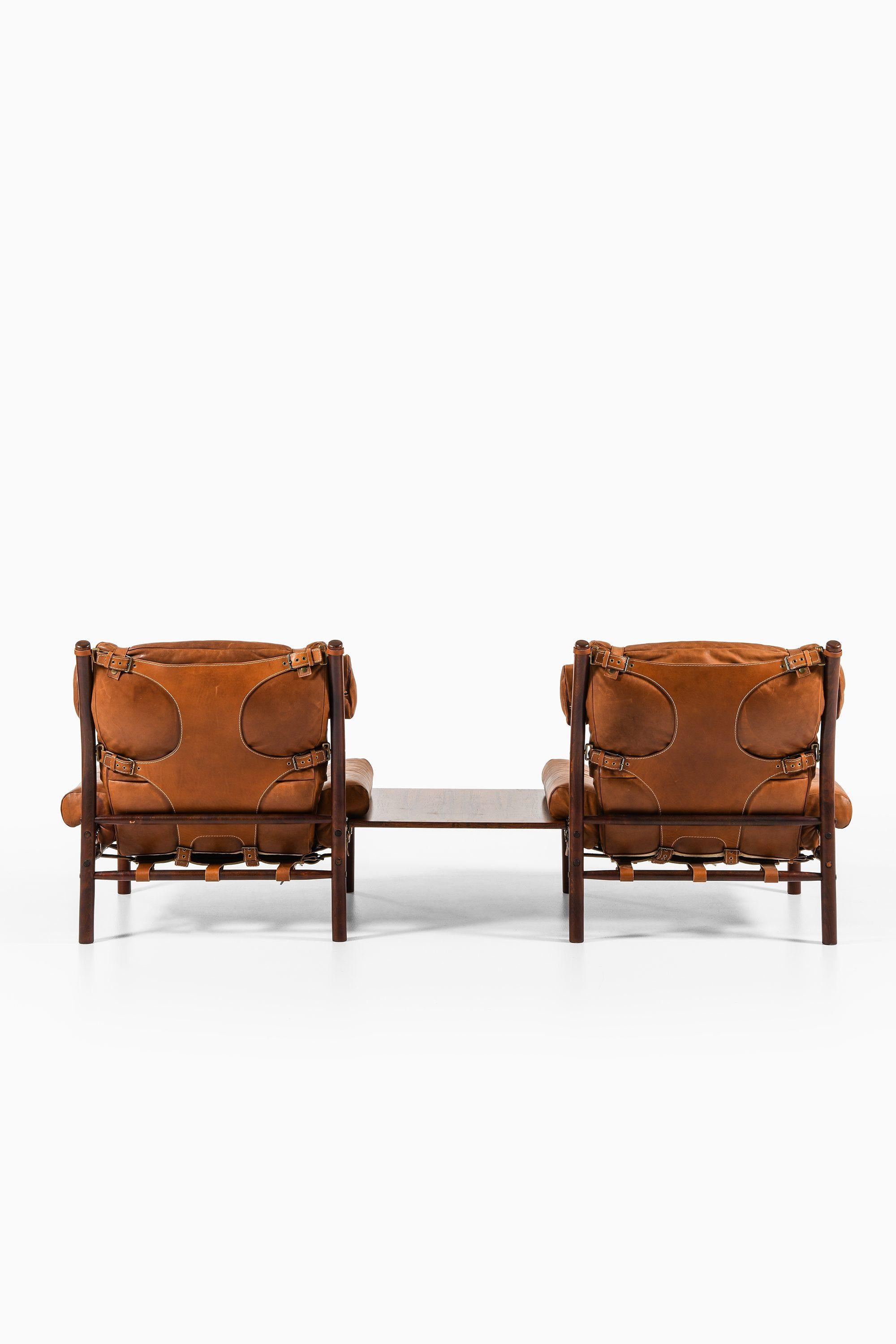 20ième siècle Paire de fauteuils avec table d'appoint en hêtre et cuir d'Arne Norell, années 1960 en vente
