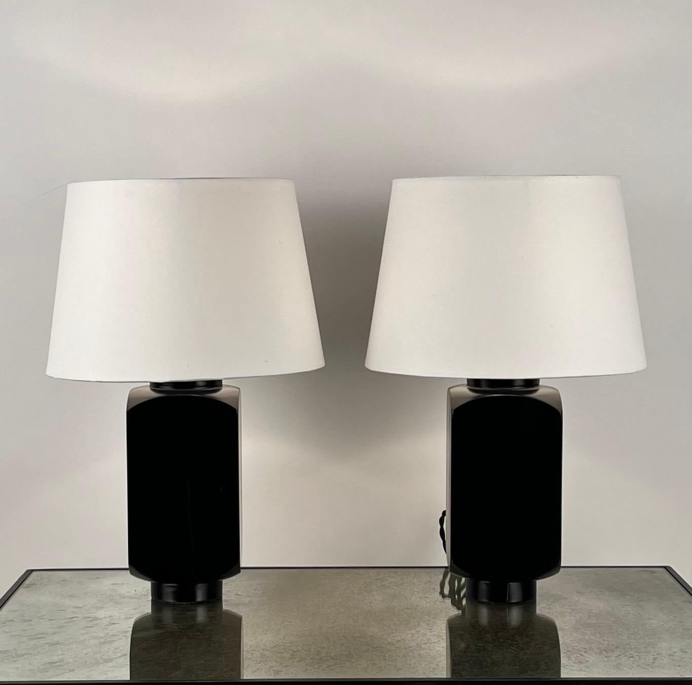 Pair of elegant 'Ébène' table lamps with parchment shades by Design Frères.

Wired with high-end twist cords and 3-way switches (on, half intensity, off). 40w filament bulbs are included in your order. European style parchment shades (no harps or