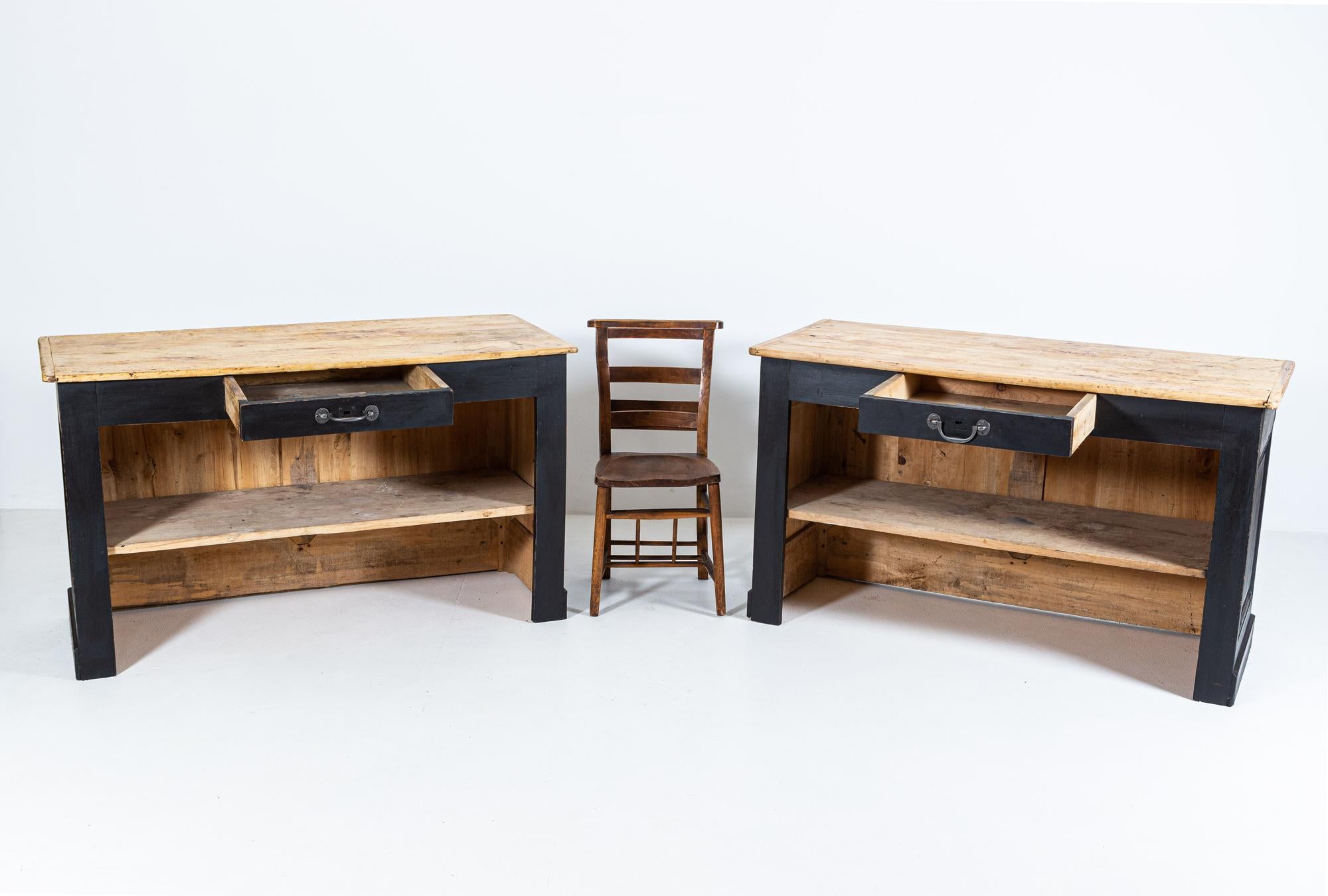 Circa 1860

Pair of matching ebonised fruitwood Parisian Boulangerie counters, matching with a single drawer and shelves. Breadboard ends to the tops.
Would make an excellent Kitchen Island.

Sourced from Paris

Price is each

Measures: W