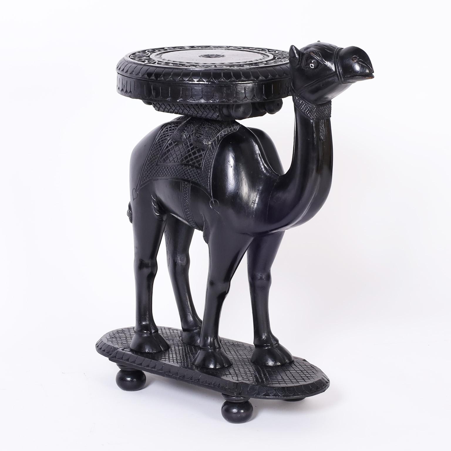 Indian Pair of Ebonized Carved Wood Camel Stands