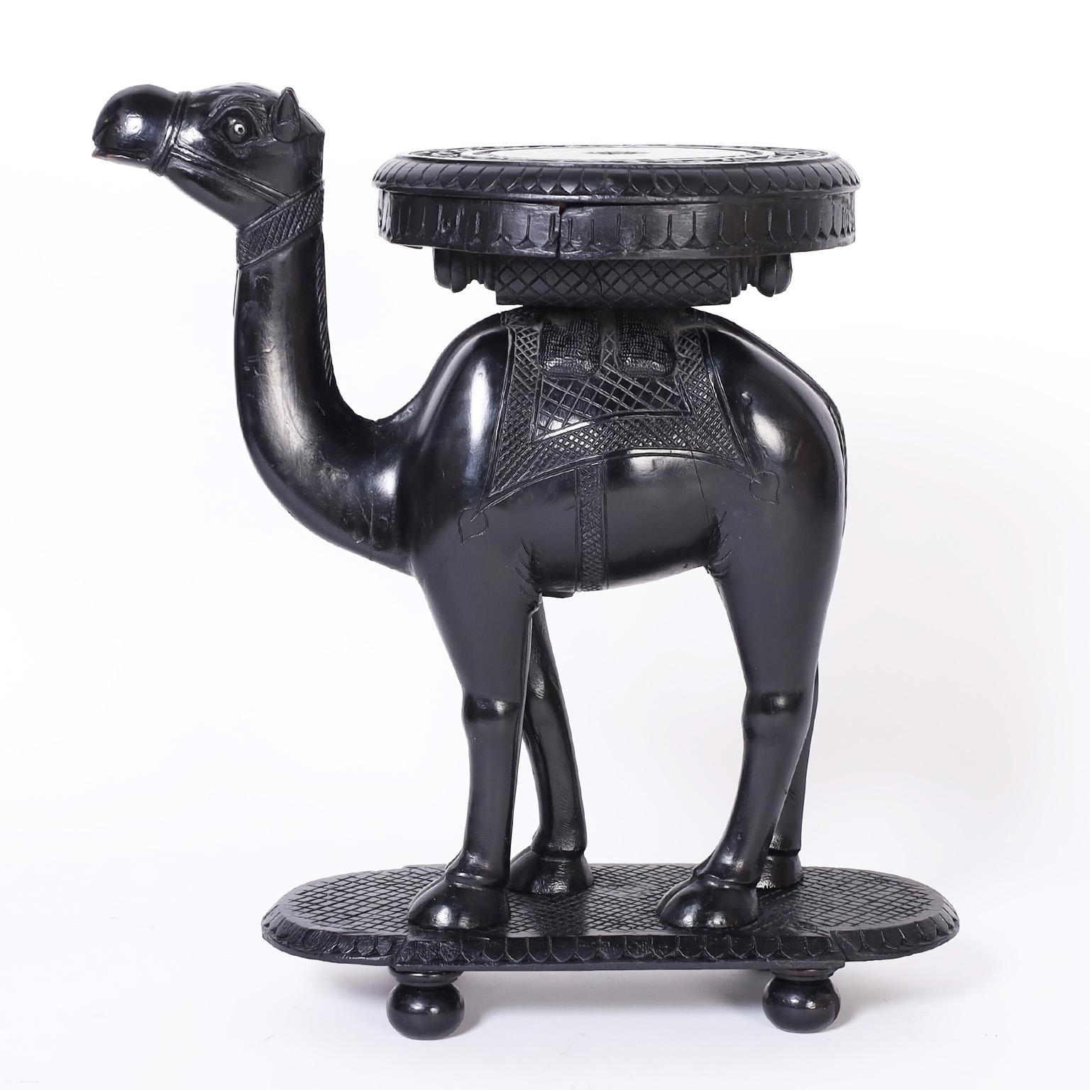 Hand-Carved Pair of Ebonized Carved Wood Camel Stands