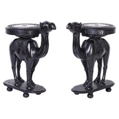 Pair of Ebonized Carved Wood Camel Stands