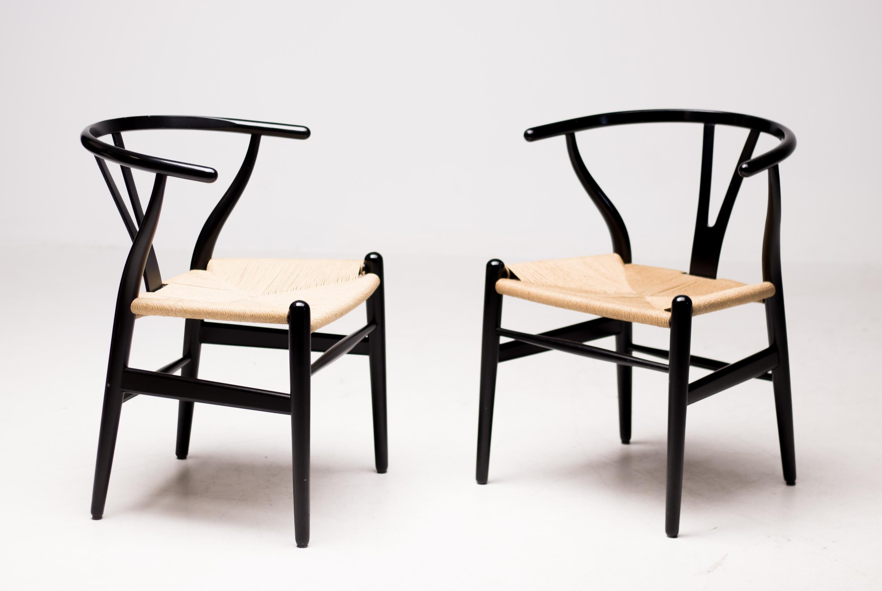 Danish Pair of Ebonized Hans Wegner for Carl Hansen CH-24 Wishbone Chairs