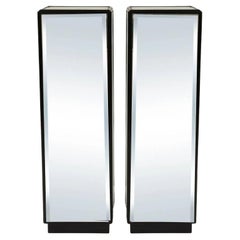Pair of Ebonized Mirrored Pedestals