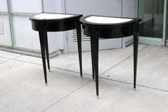Pair of Ebonized Neoclassical Demi Lune Marble Top Consoles