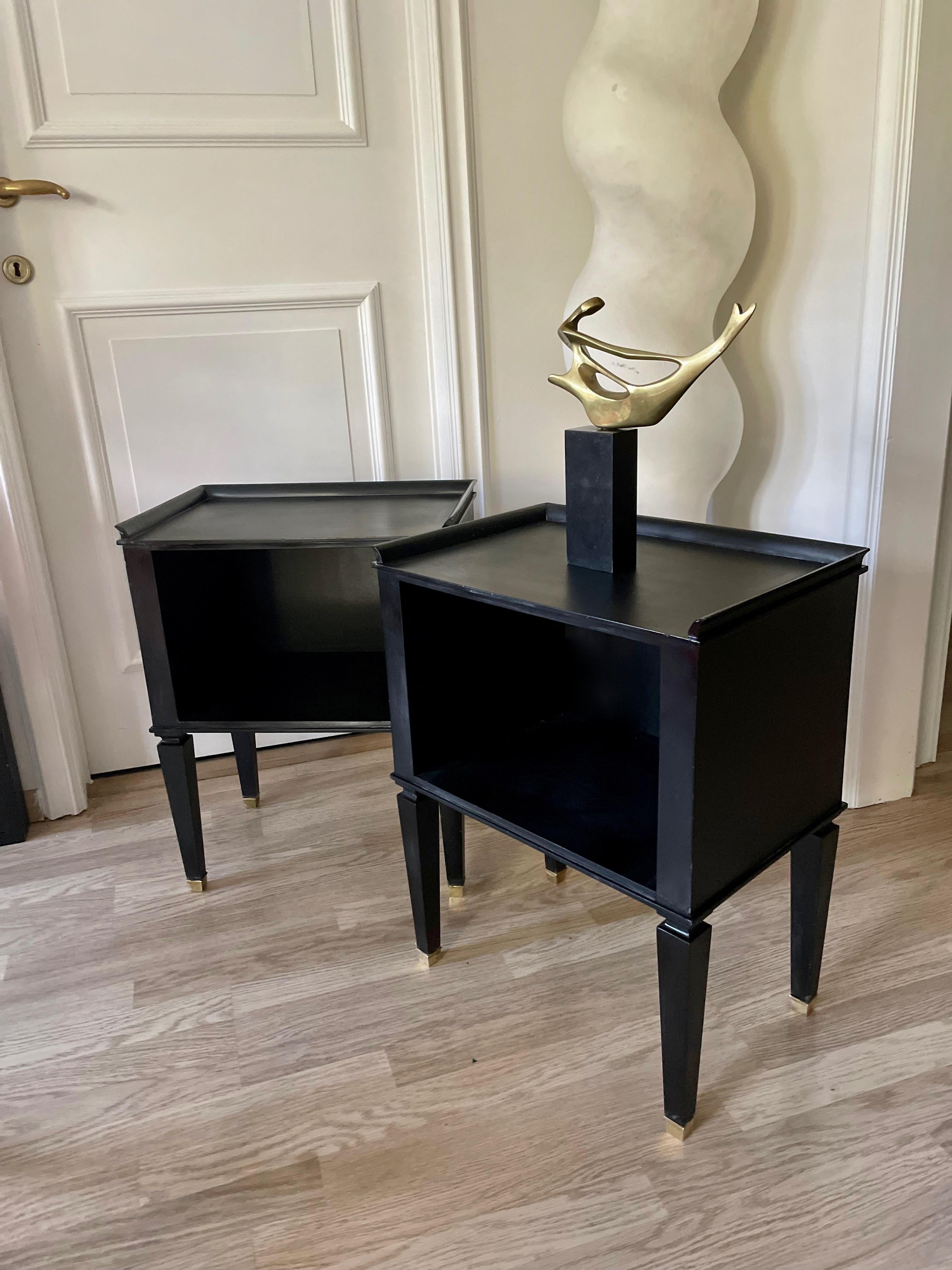 Elegant pair of neoclassical ebonized side tables in the style of Maison Jansen.
Brass sabots.
Belgium 1950.