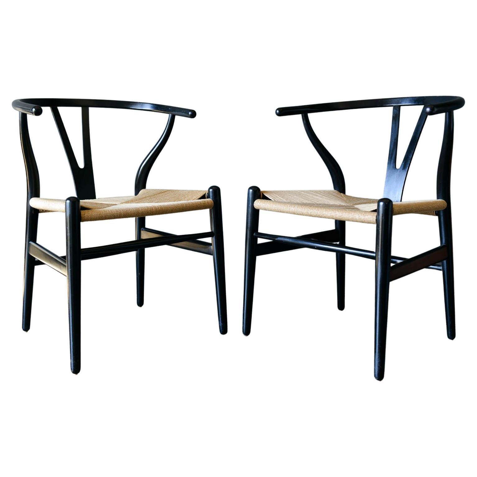 Pair of Ebonized Oak Wishbone Dining Chairs by Hans J. Wegner, ca. 1955 For Sale