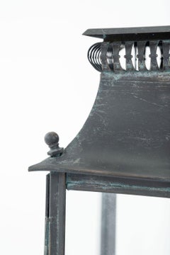 Pair of Ebonized Tole and Glass Wall-Mounted Lanterns