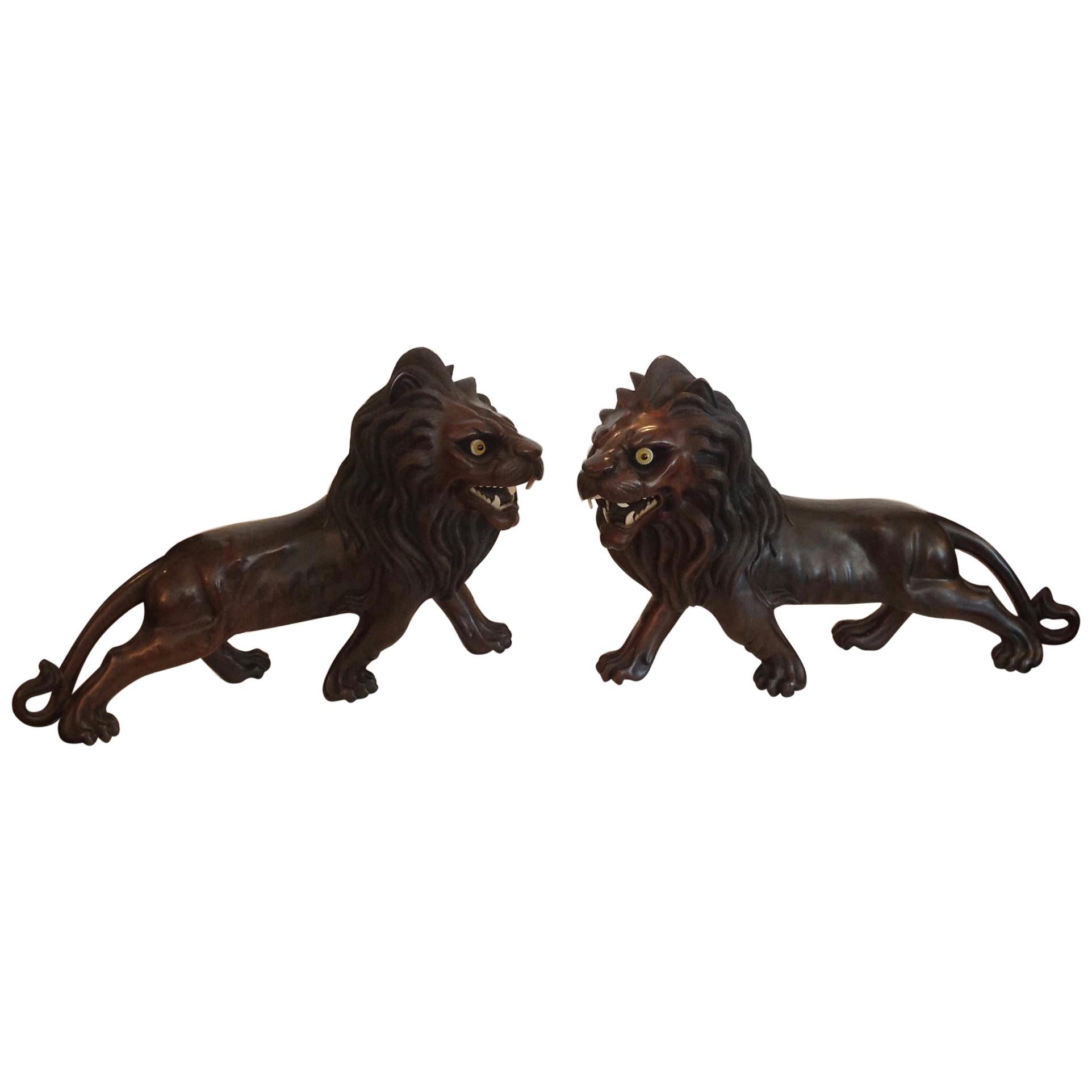 Pair of Ebony Indo, Burmese Figures of Lions