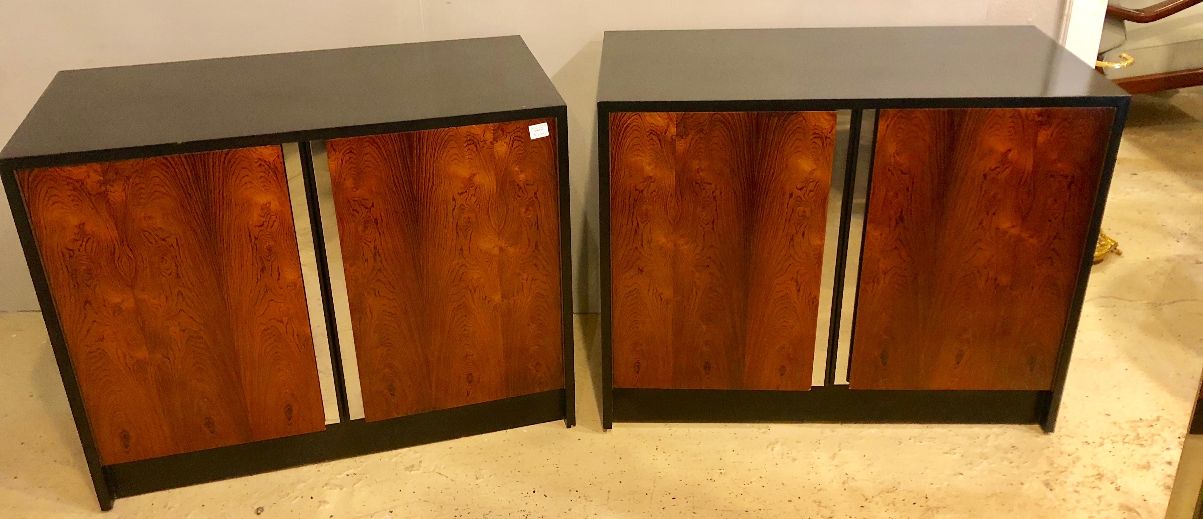Pair of ebony and rosewood commodes or nightstands with chrome trim and that special Milo Baughman look. This pair of finely polished rosewood cabinets, nightstand or commodes in the Milo Baughman style are certain to draw attention. The pair having