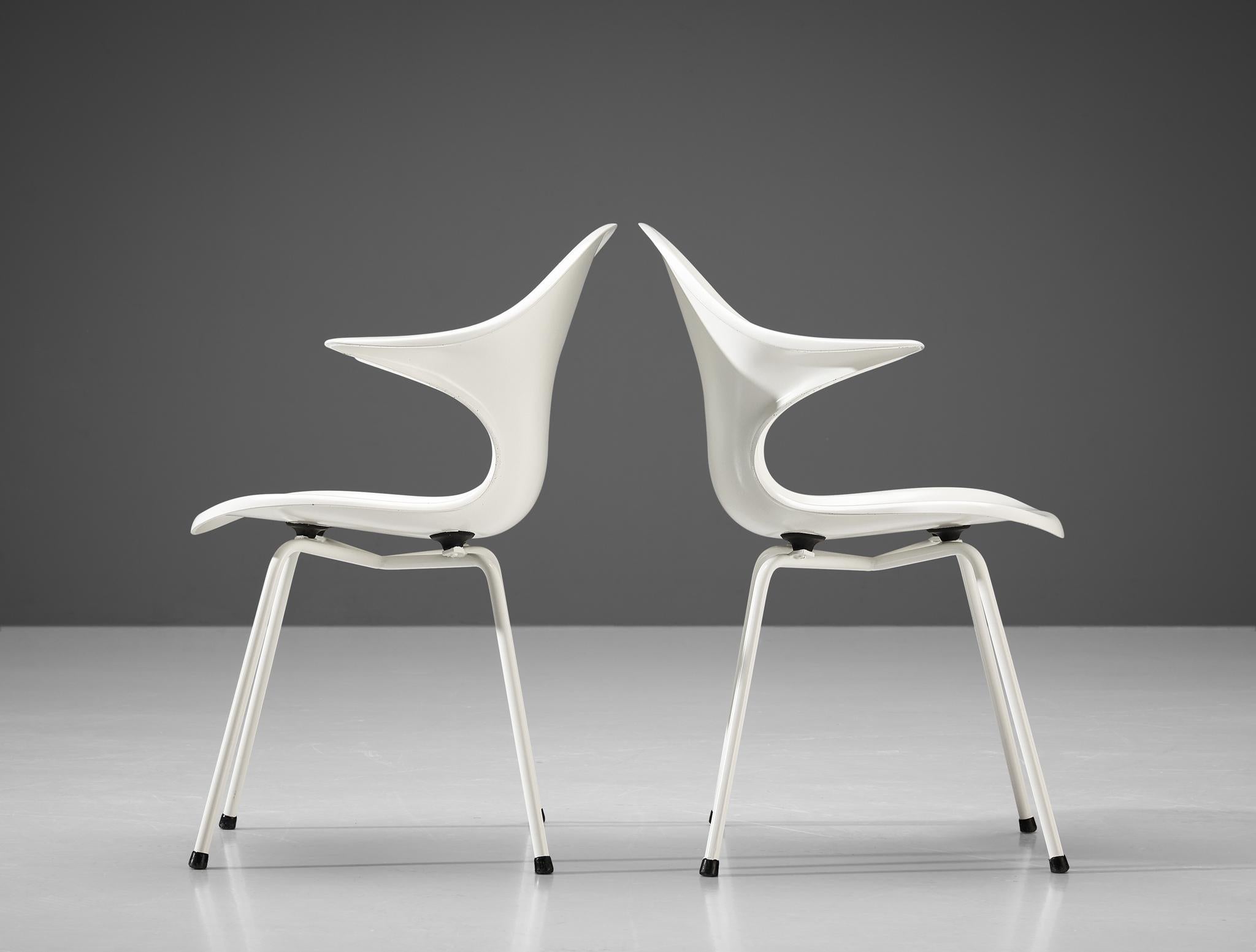 Pair of armchairs, in metal and fiberglass, Italy 1960s. 

Pair of quirky Italian armchairs executed in white fiberglass and white lacquered metal. The construction of the chairs is based on a combination of curves, edges and points, which create
