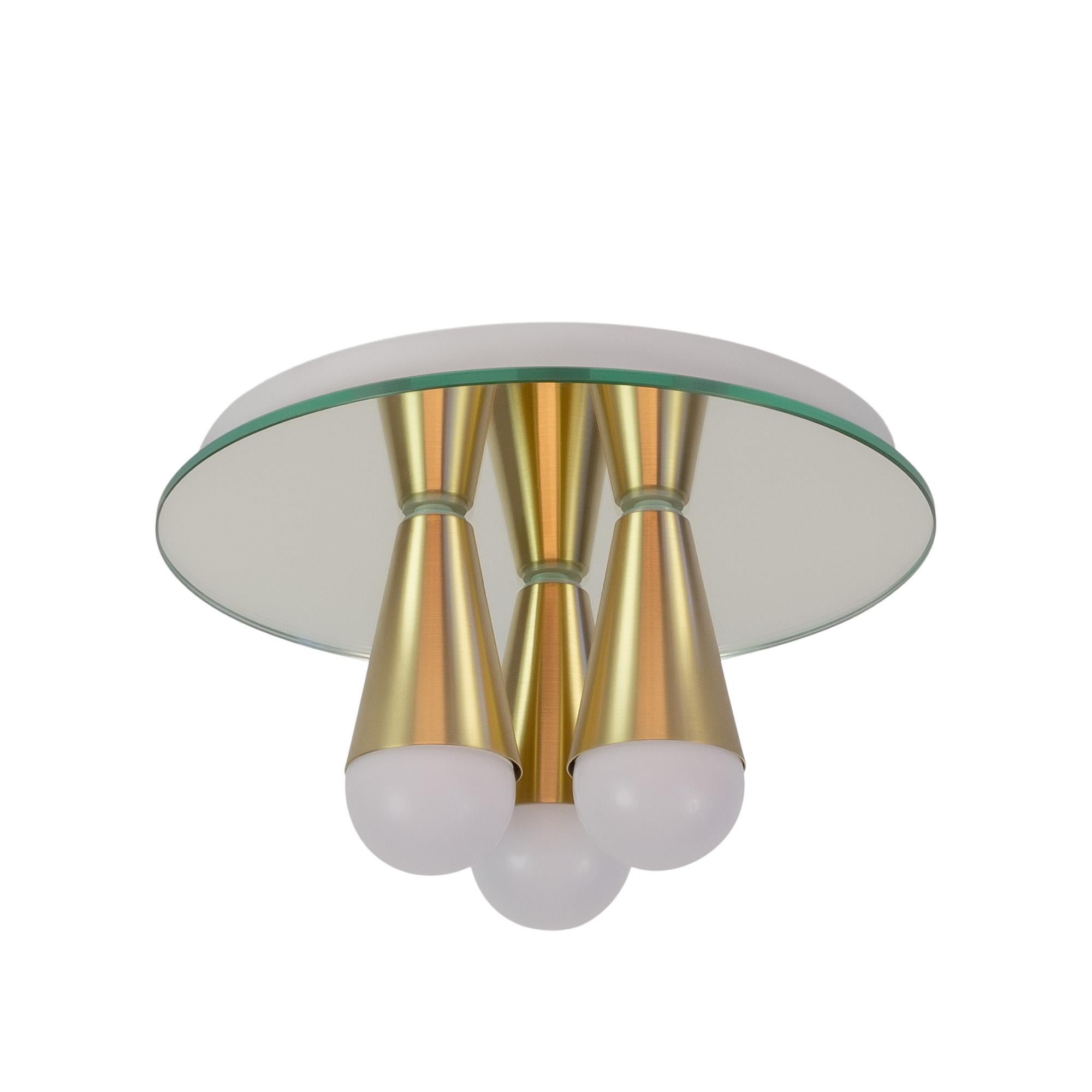 This listing is for a pair of the Echo three sconces. The price includes two lights.

Simple, elegant and playful, the Echo Series is a line of surface-mount fixtures that can be used on a wall or ceiling. White or brass cones mount to mirrored