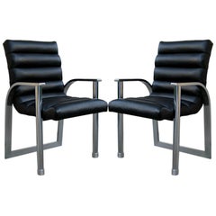 Pair of Eclipse Lounge Chairs by Jay Spectre