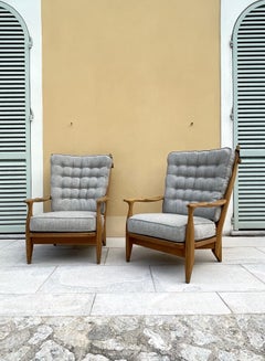 Pair of " Edouard" lounge chairs Guillerme et Chambron, France, mid-50's