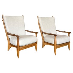 Pair of " Edouard" lounge chairs Guillerme et Chambron, France  mid 50's