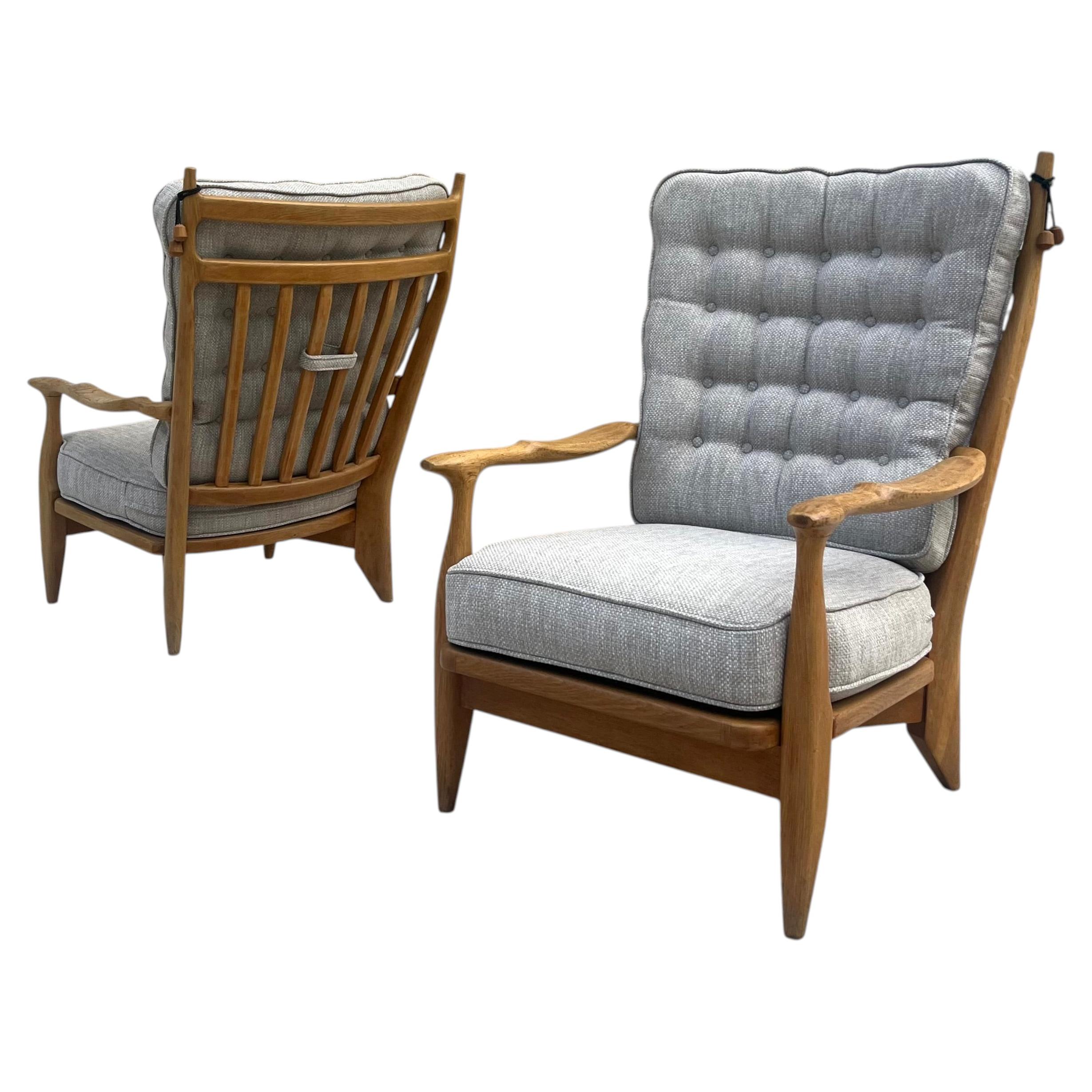 Pair of " Edouard" lounge chairs Guillerme et Chambron, France, mid-50's