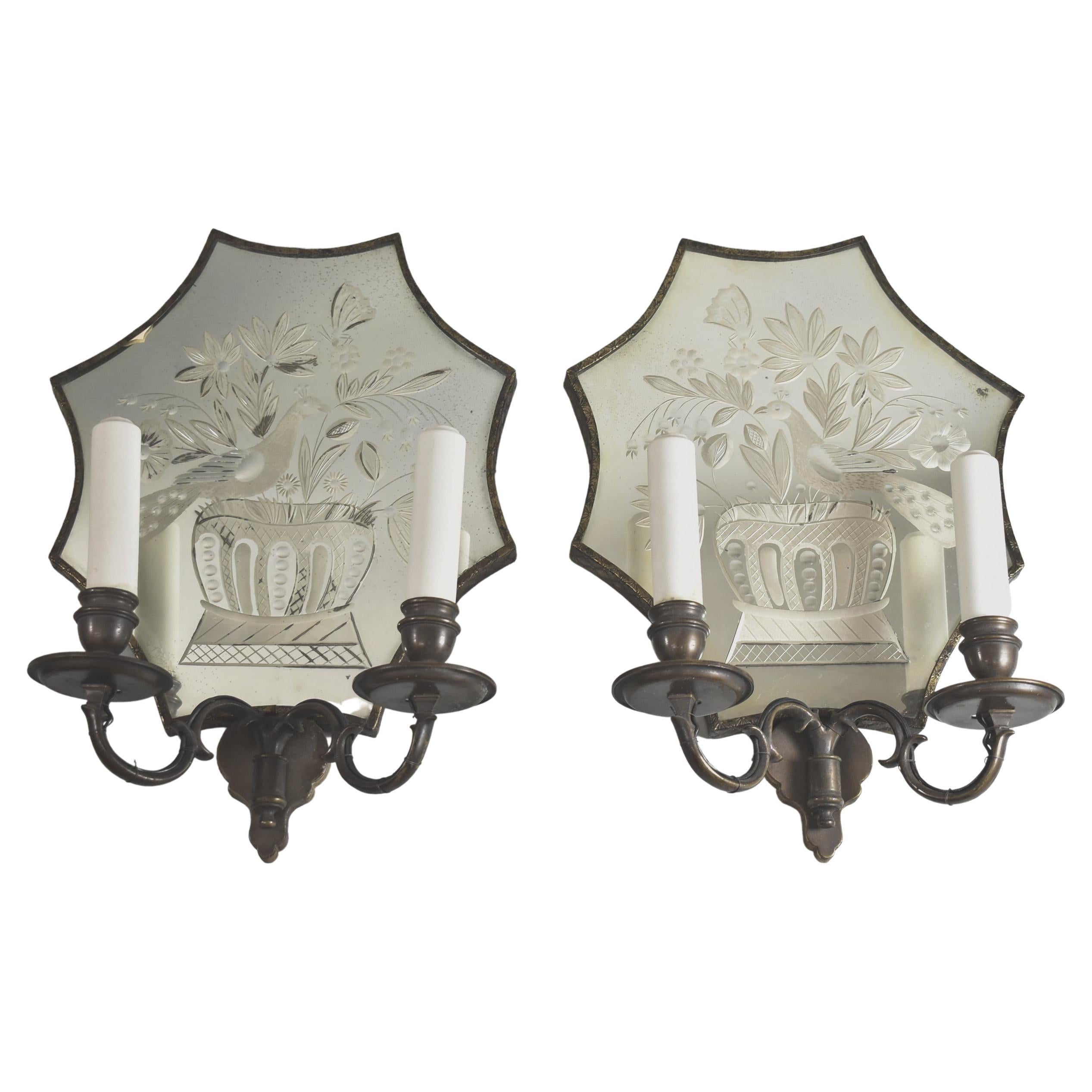 Pair of Edward Caldwell Etched Peacock and Floral Mirrored Bronze Sconces