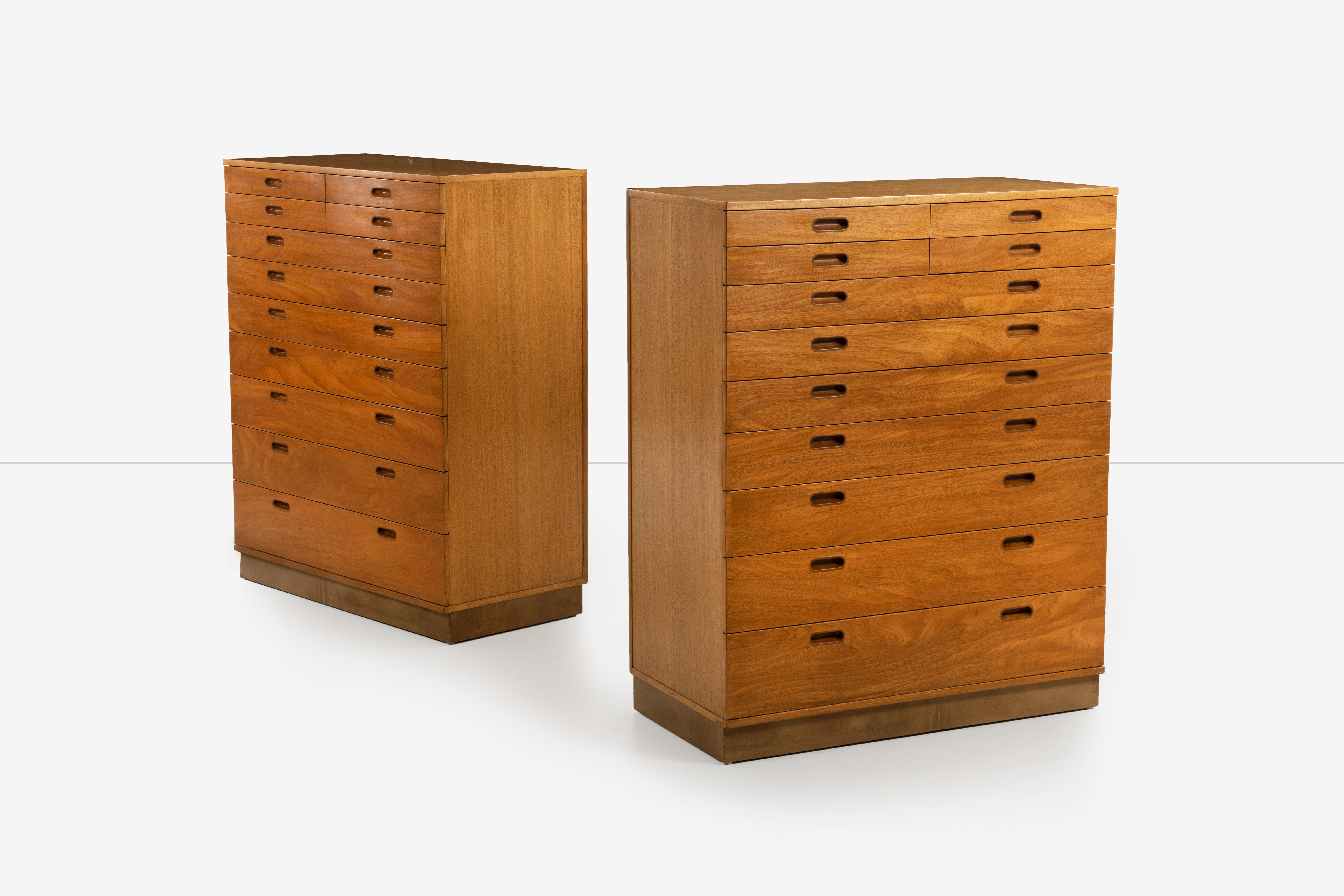 Pair of Edward Wormley for Dunbar his and hers dressers, each case has 11 drawers 22 in total.
Original mahogany-wood with cut-out finger pulls and wrapped leather plinth bases. Some drawers have removable dividers. All drawers in fine working