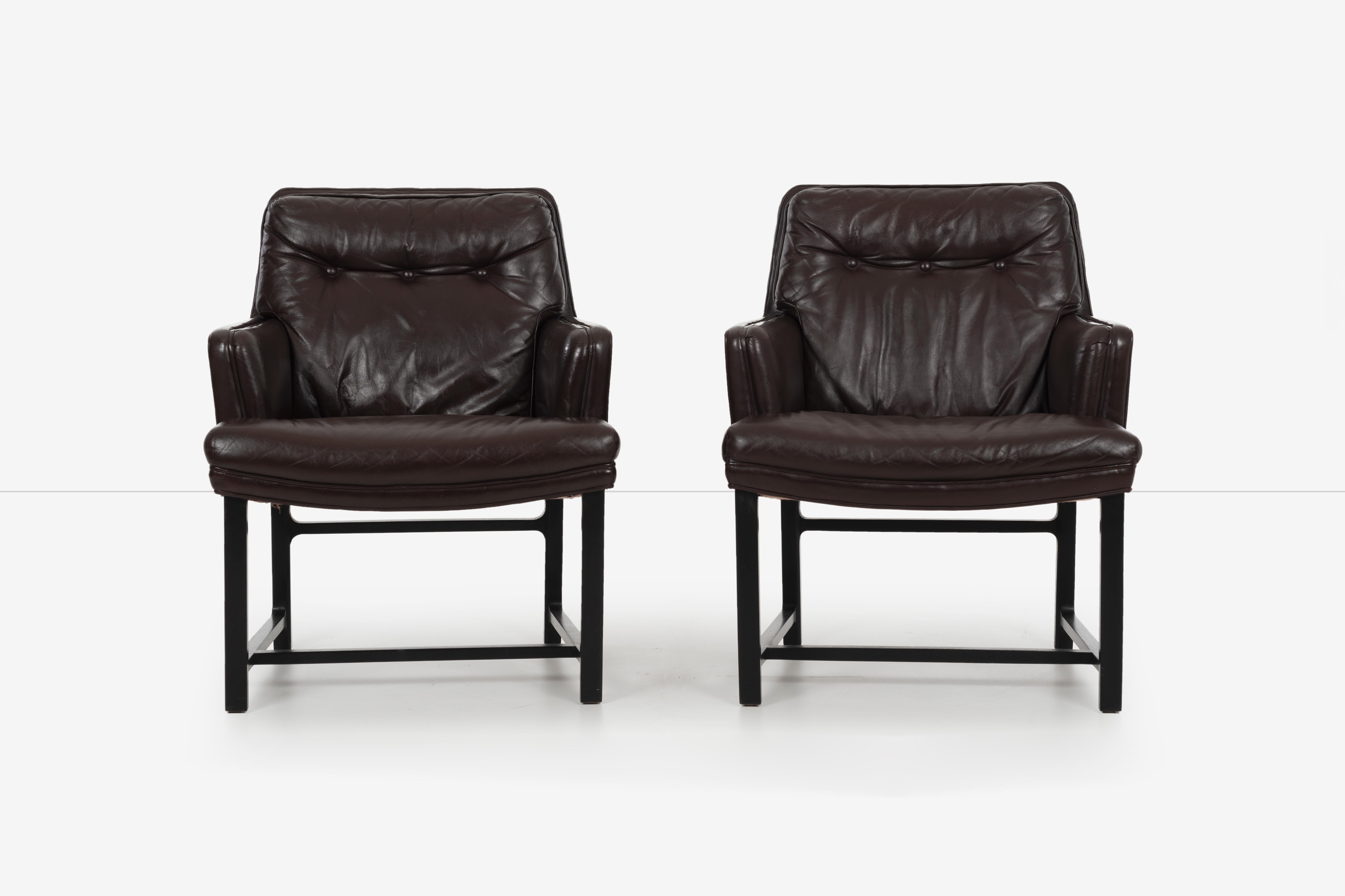 Pair of Edward Wormley for Dunbar pull-up lounge chairs. Model 971 Jansus line collection.
Wormley's Boutique line. Original chocolate brown leather with solid walnut legs.
[Dunbar tag on underside].

 