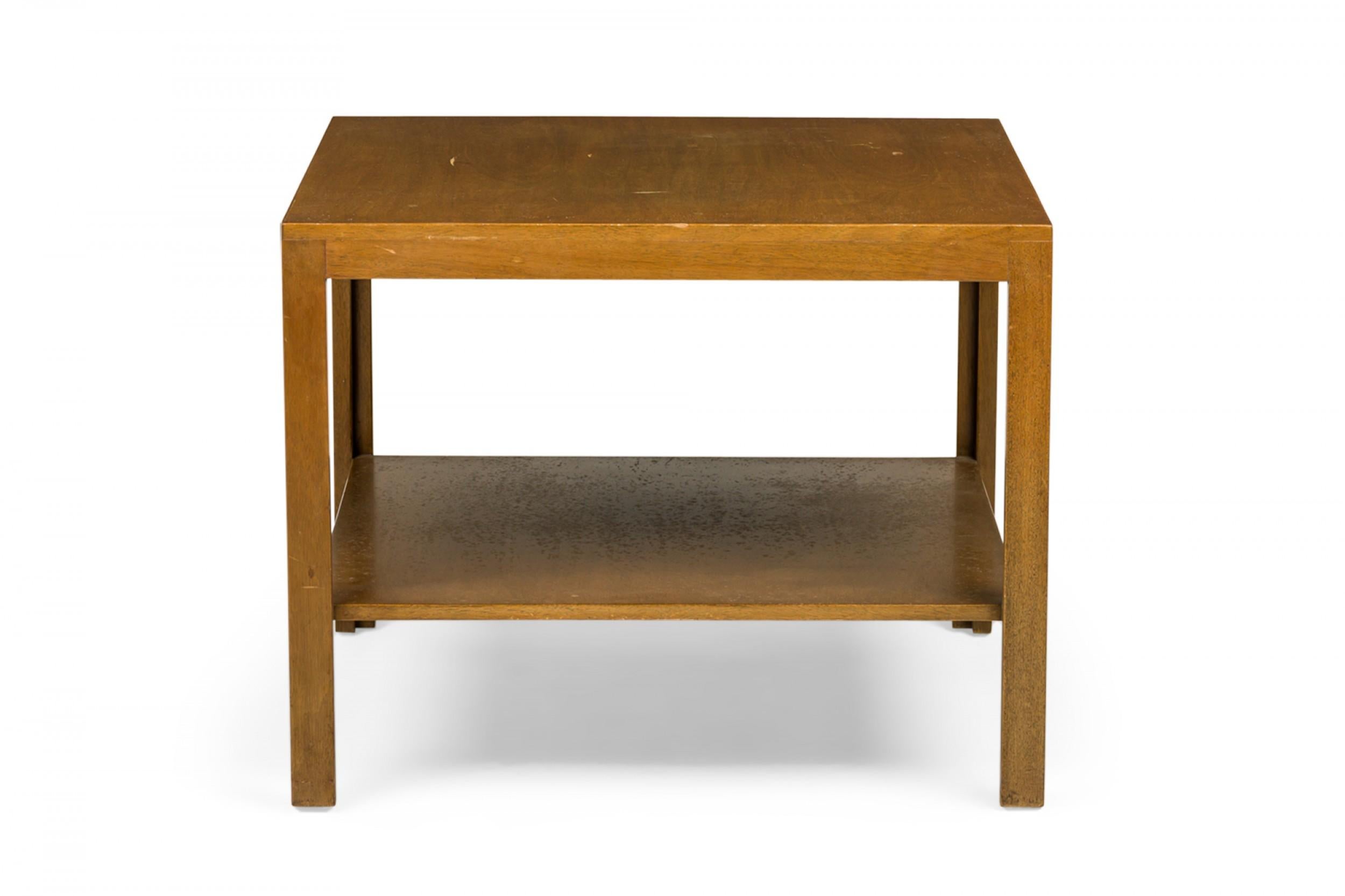 PAIR of American Mid-Century square wooden end / side tables with a lower square stretcher shelf connecting four square legs. (EDWARD WORMLEY FOR DUNBAR FURNITURE COMPANY)(PRICED AS PAIR).