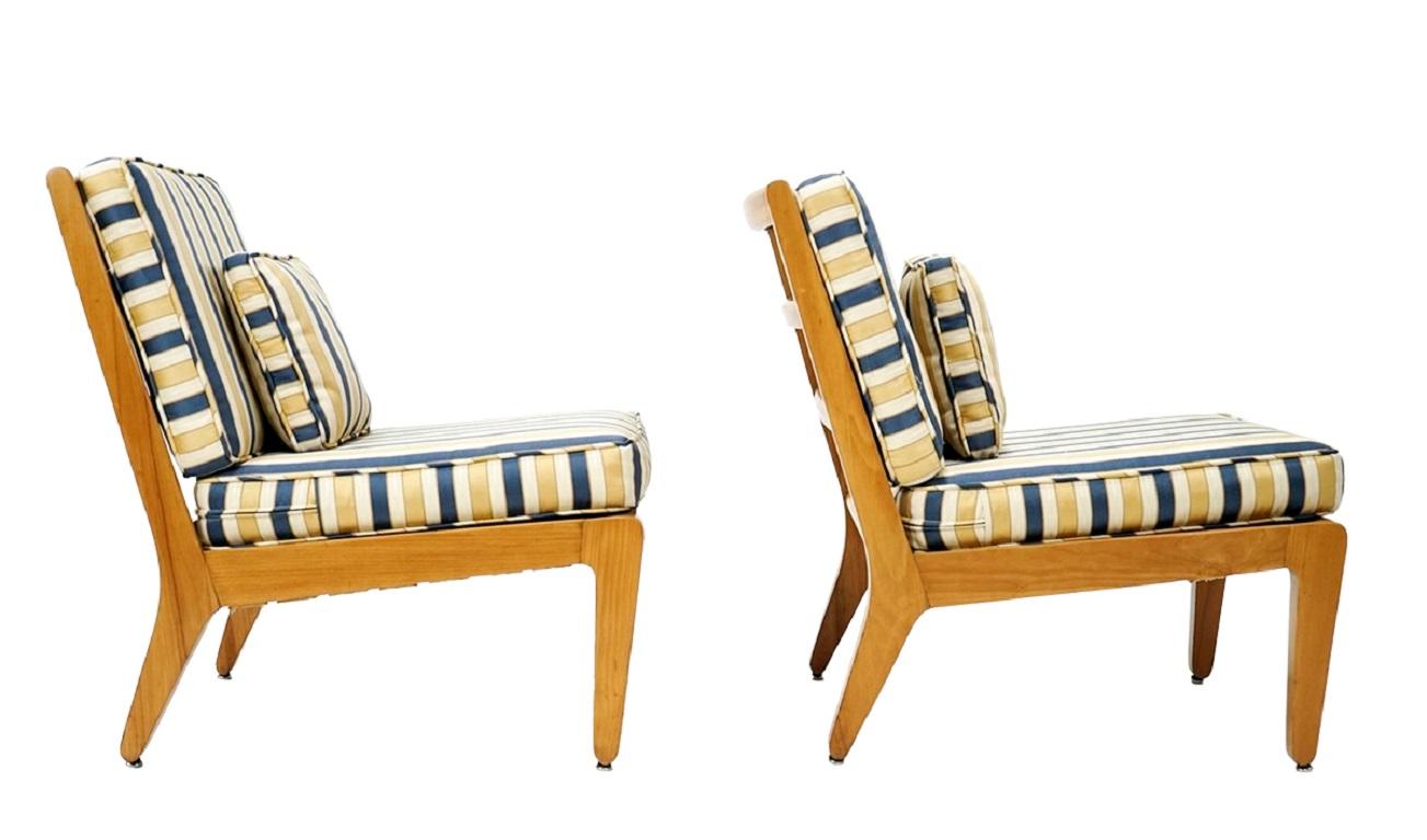 Pair of Edward Wormley Lounge Chairs

Additional information:
Material: Wood
Featured at Kensington: 
Beautiful pair of armless slipper chairs designed by Edward Wormley.
Solidly built blond wood frame holds a back and seat cushion.
Perfectly