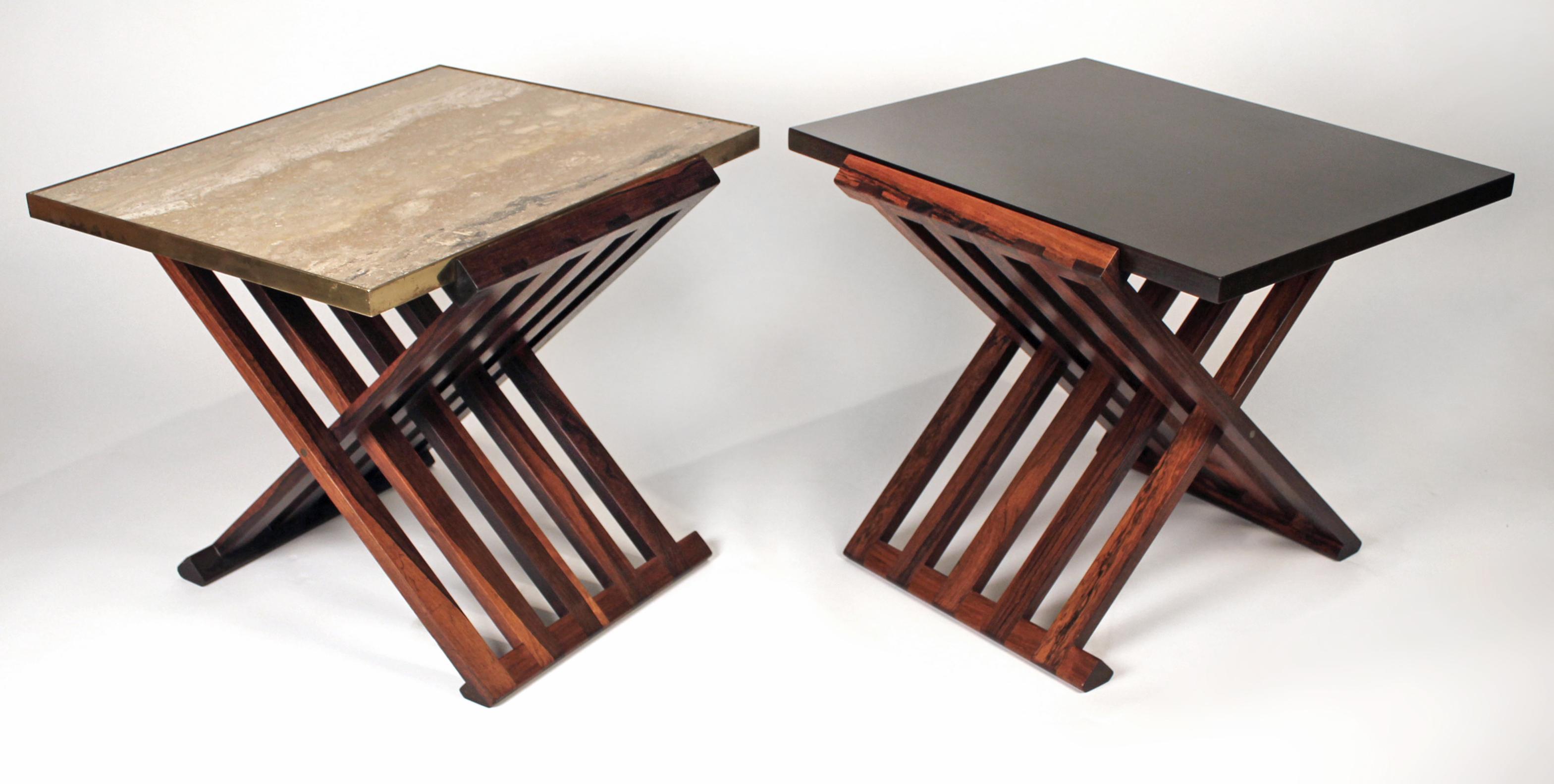Solid Brazilian rosewood X-base occasional tables designed by Edward Wormley model number 5425.

One table has a mahogany top with the original Dunbar 