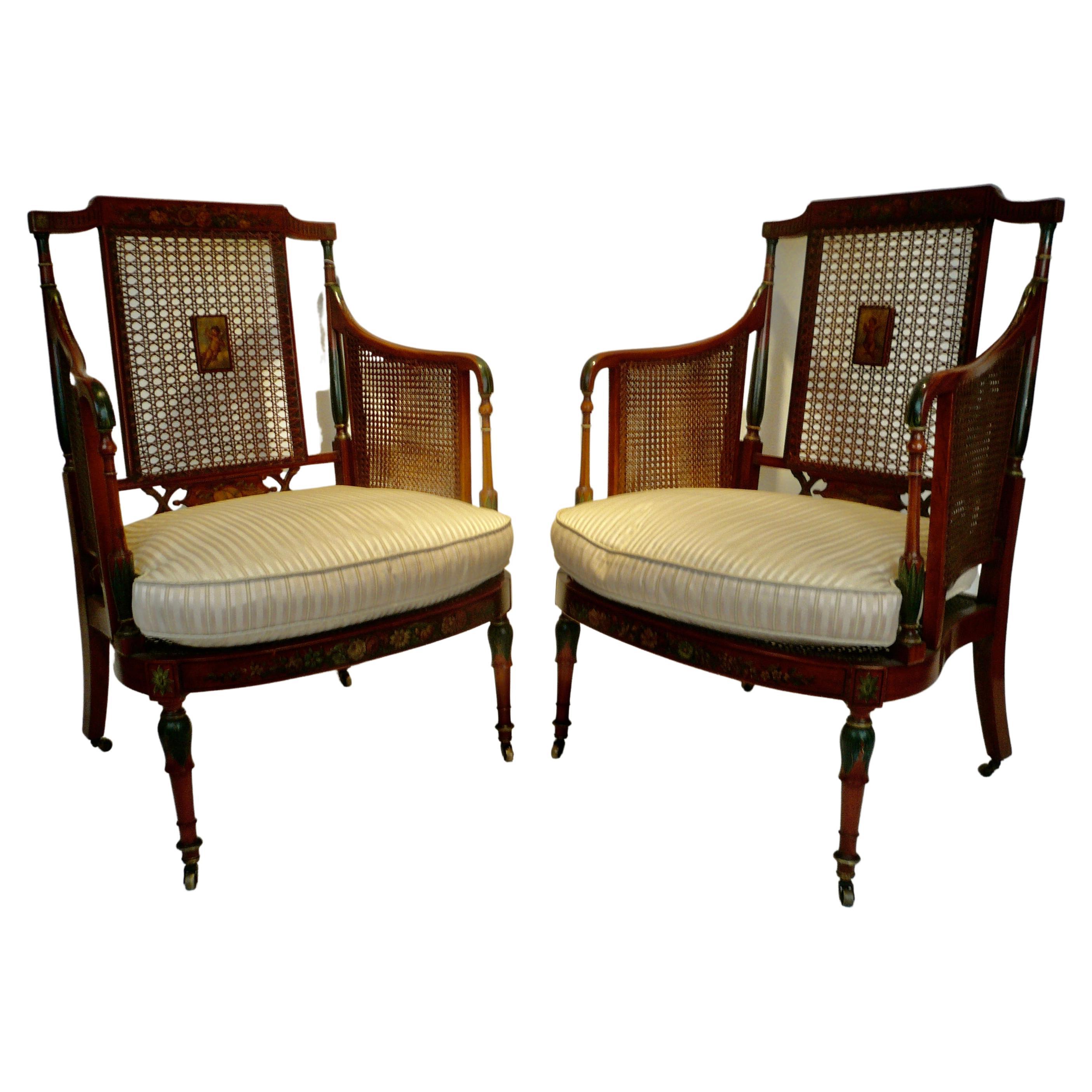 Pair of Edwardian Angelica Kaufmanstyle Painted Satinwood and Cane Armchairs For Sale
