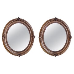 Pair of Edwardian Carved Giltwood Framed Mirrors with Floral Decoration