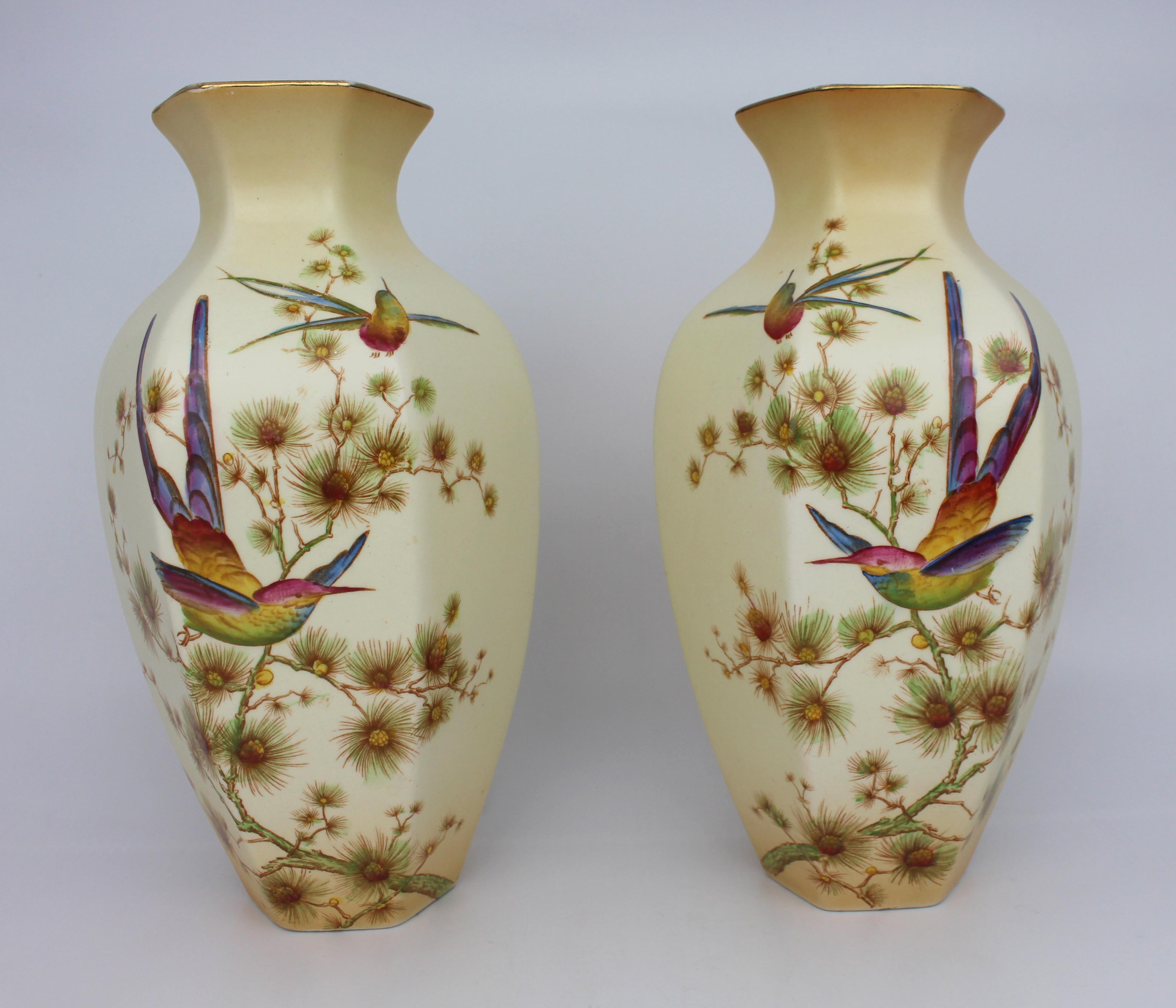 Pair of Edwardian crown Ducal ware vases



Early 20th century, English.


Hexagonal form baluster vase


Blush ivory ground with finely painted decoration; a songbird to one side and a butterfly to the reverse.


A true matched and