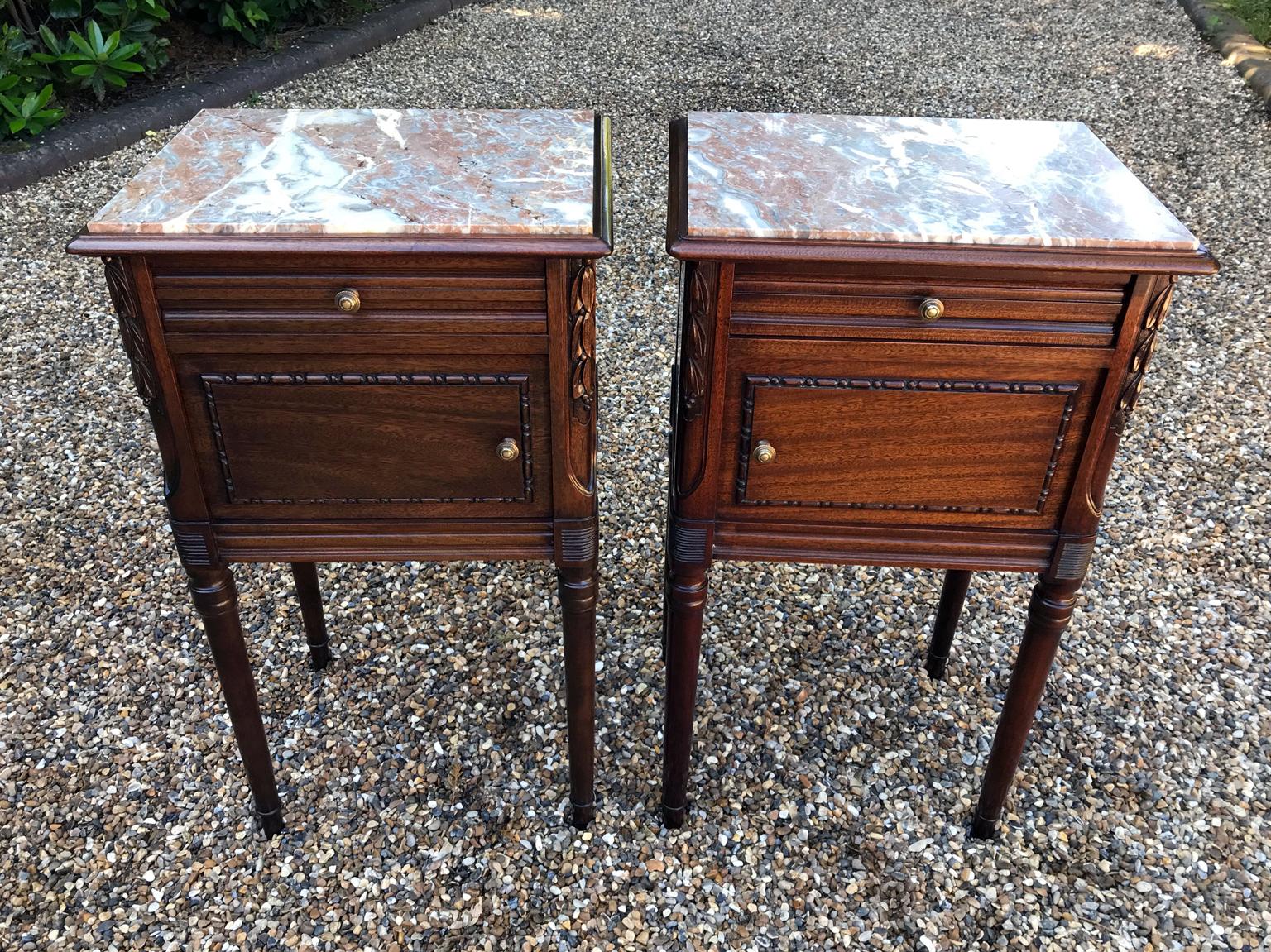 A pair of Edwardian French mahogany bedside tables each inset with marble tops, above a fitted drawer and door, raised on turned legs,

circa 1901-1910

Dimensions:
Height 33 inches – 83 cms
Width 18.5 inches – 47 cms
Depth 14.5 inches – 37