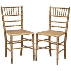 Antique Pair of Edwardian Giltwood Famboo Regency Style Bergere Chairs with Gold Gilding