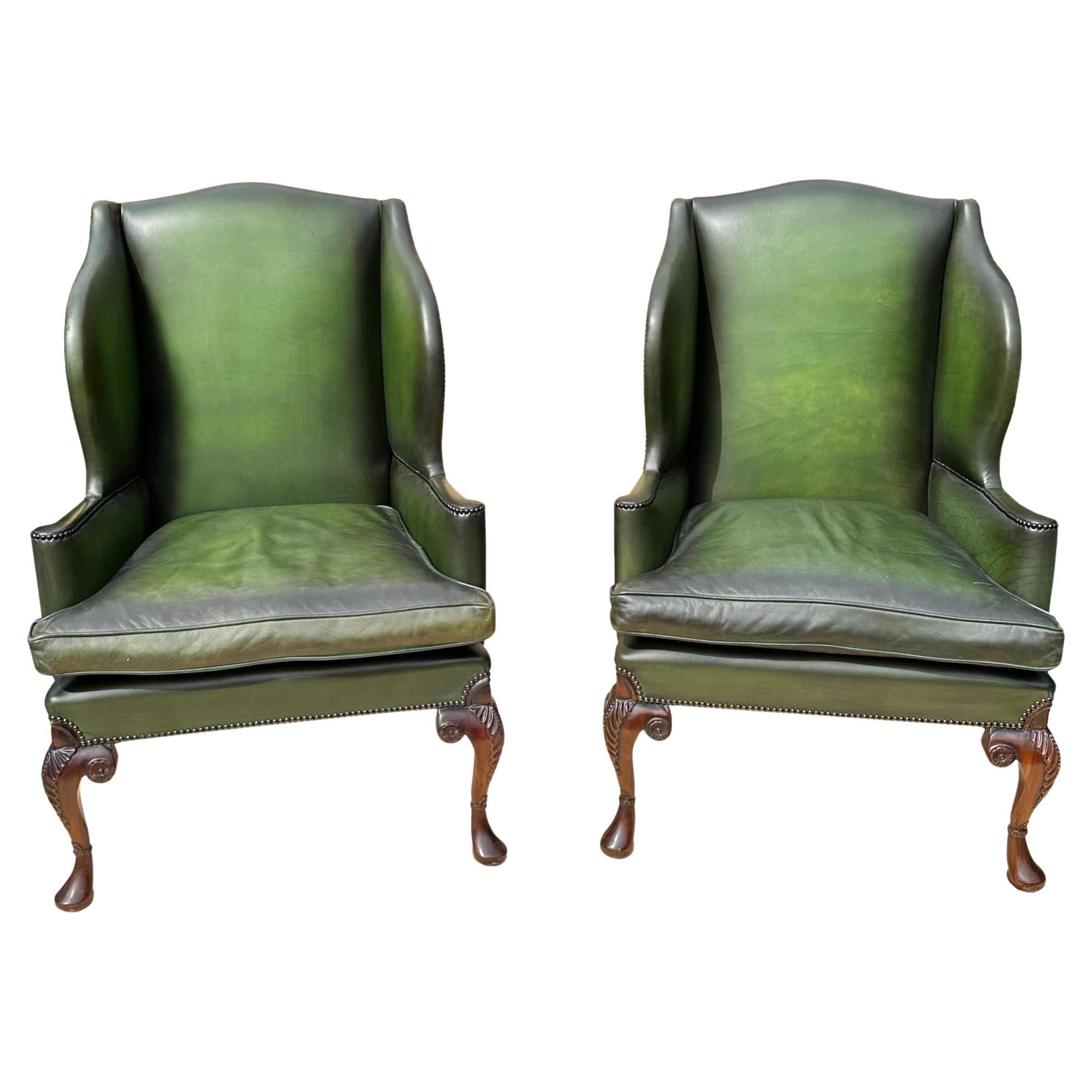 Pair of Edwardian Green Leather Wing Back Chairs, English, ca. 1920.