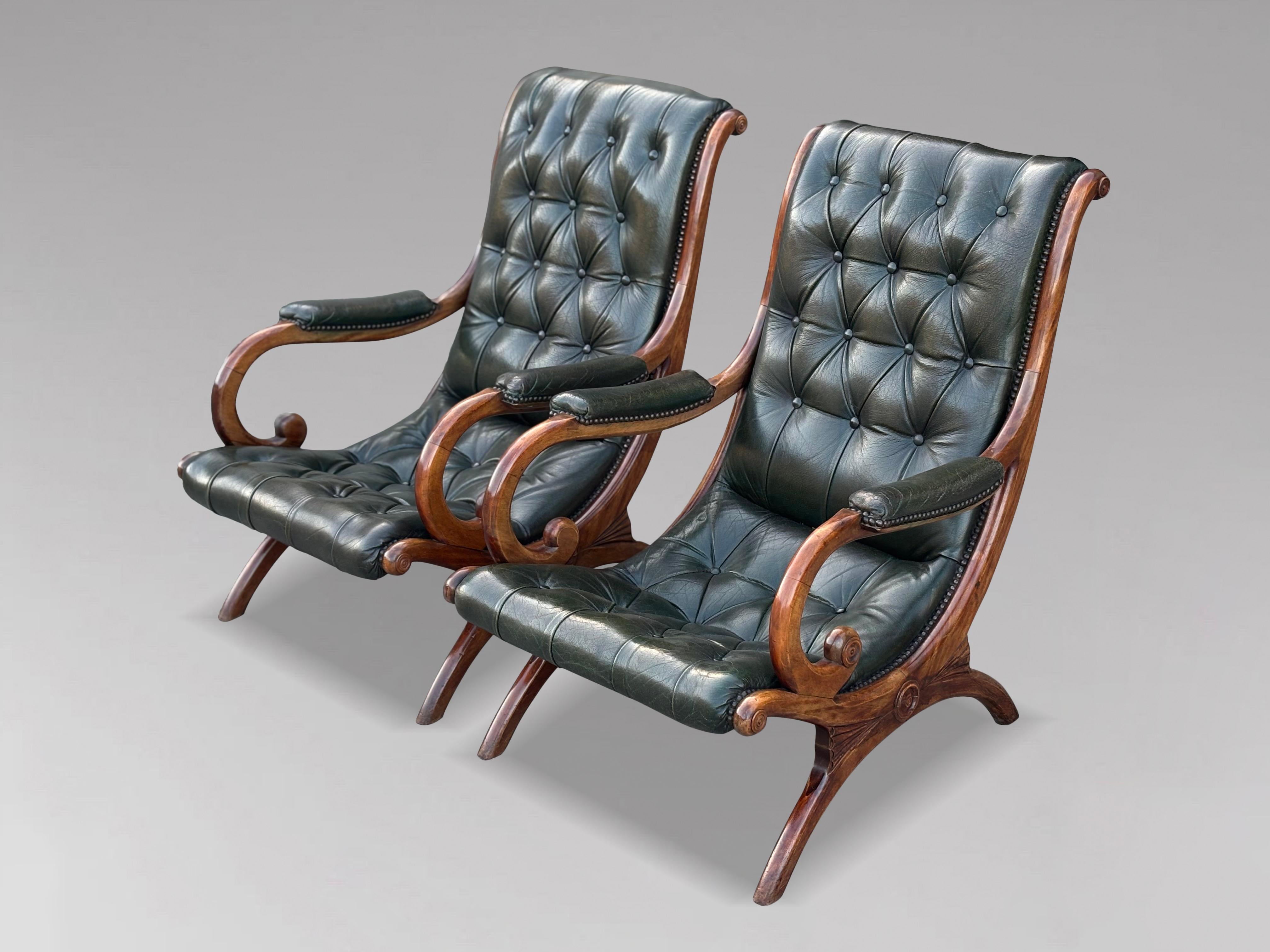 Pair of Edwardian Period Green Leather Slipper Armchairs

This good quality pair of early 20th-century Edwardian period green leather Chesterfield slipper armchairs features deep buttoned leather upholstery on both the back and seat. The chairs are