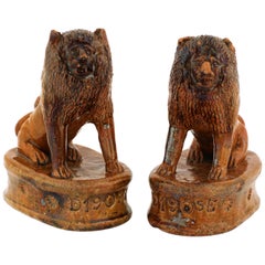 Antique Pair of Edwardian Period Naïve Treacle-Glazed Pottery Lions, circa 1905
