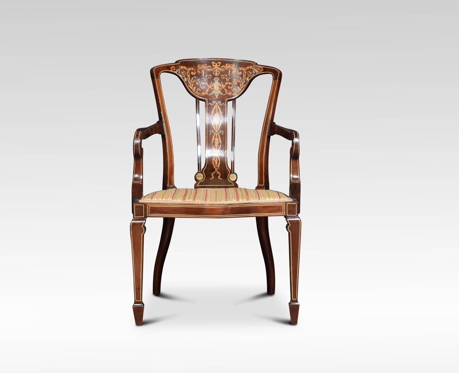 A pair of armchairs the shaped backs finely inlaid depicting scenes of figures holding garlands of flowers and ribbons with swags, to the upholstered seats flanked by out swept scrolling arms, supported on square tapering legs terminating in spade
