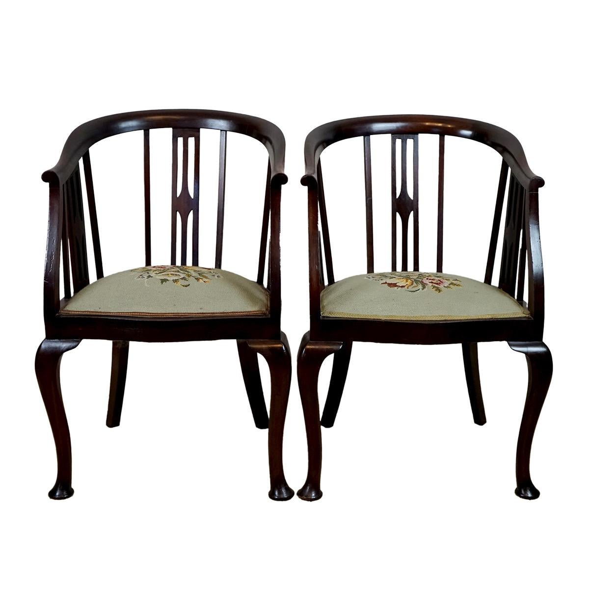 Pair of Edwardian  stick and tub back armchairs with Berlin wool-work seats raised on cabriole supports .Don't hesitate to contact me if you have any questions.
Please have a closer look at the pictures because they form part of the description.
All