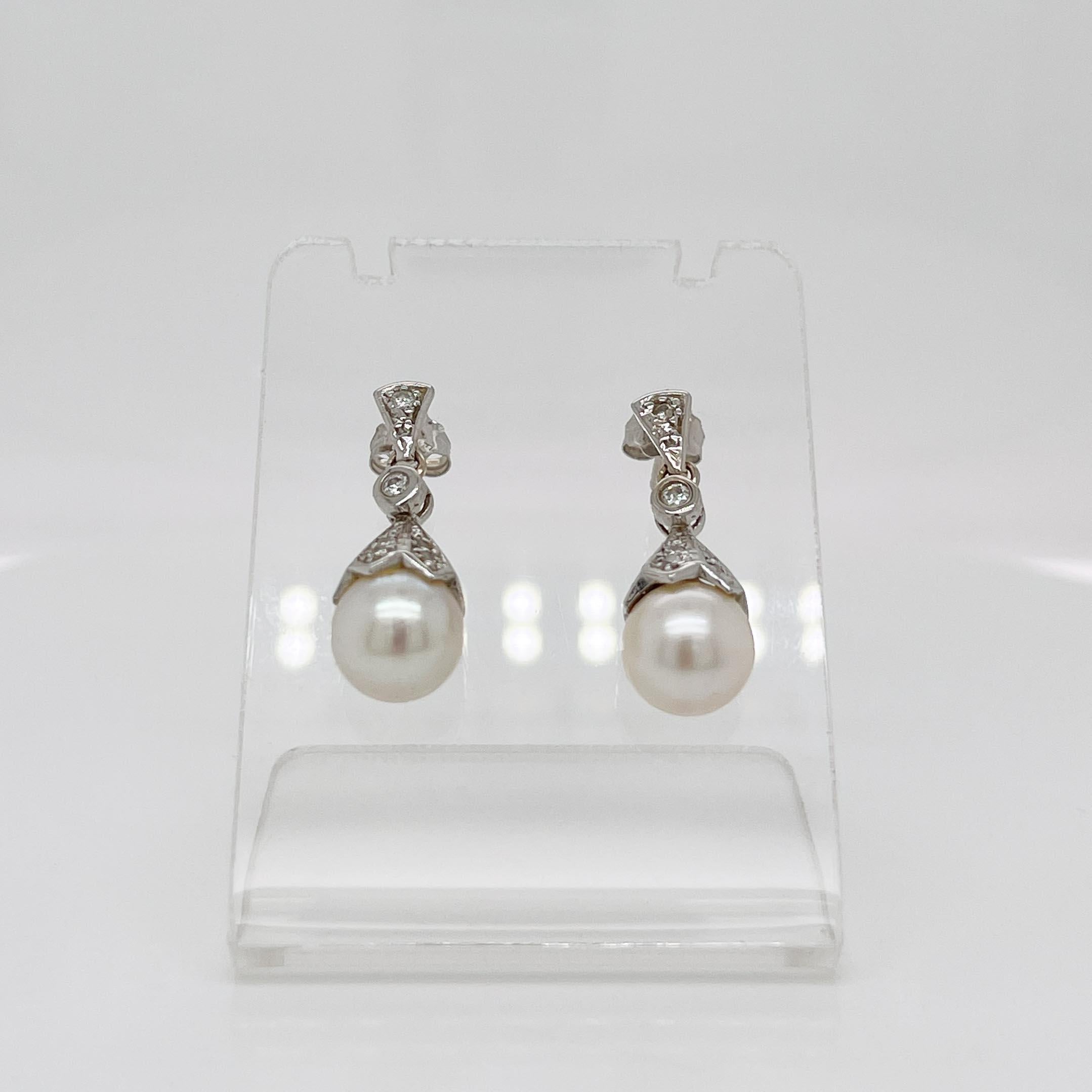 Round Cut Pair of Edwardian Style Pearl, Diamond & 14 Karat White Gold Earrings