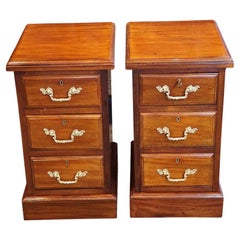 Pair of Edwardian walnut bedside chests