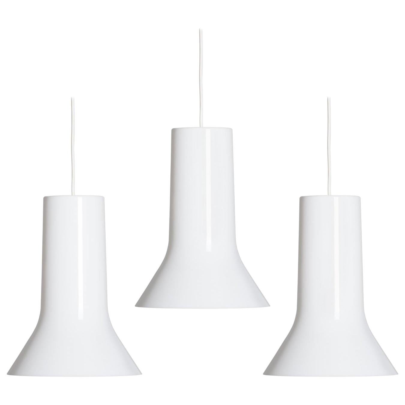Pair of Eero Aarnio 'Vaasi' Pendants in White for Innolux Oy. Designed in 2011, Aarnio's iconic light consists of two acrylic shades of different colors, one nesting inside the other. Aarnio’s original concept of flower vases nesting inside each