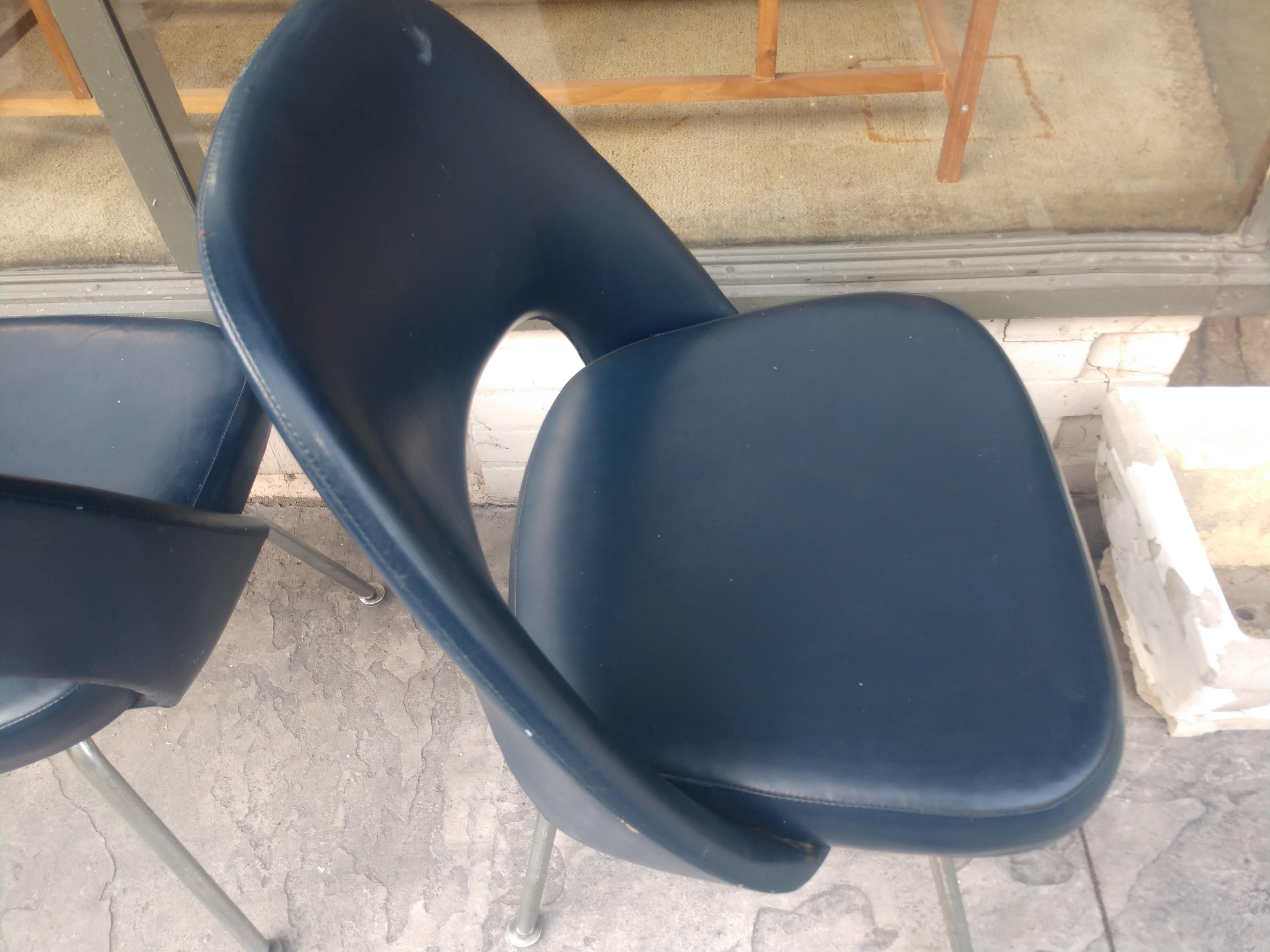 Pair of Saarinen executive side chairs by Knoll. Not signed but they came from the IBM building in East Fishkill NY. Sold and priced as a pair. Vinyl fabric could use an update. Seat hgt is 18.25. Can be parcel posted.