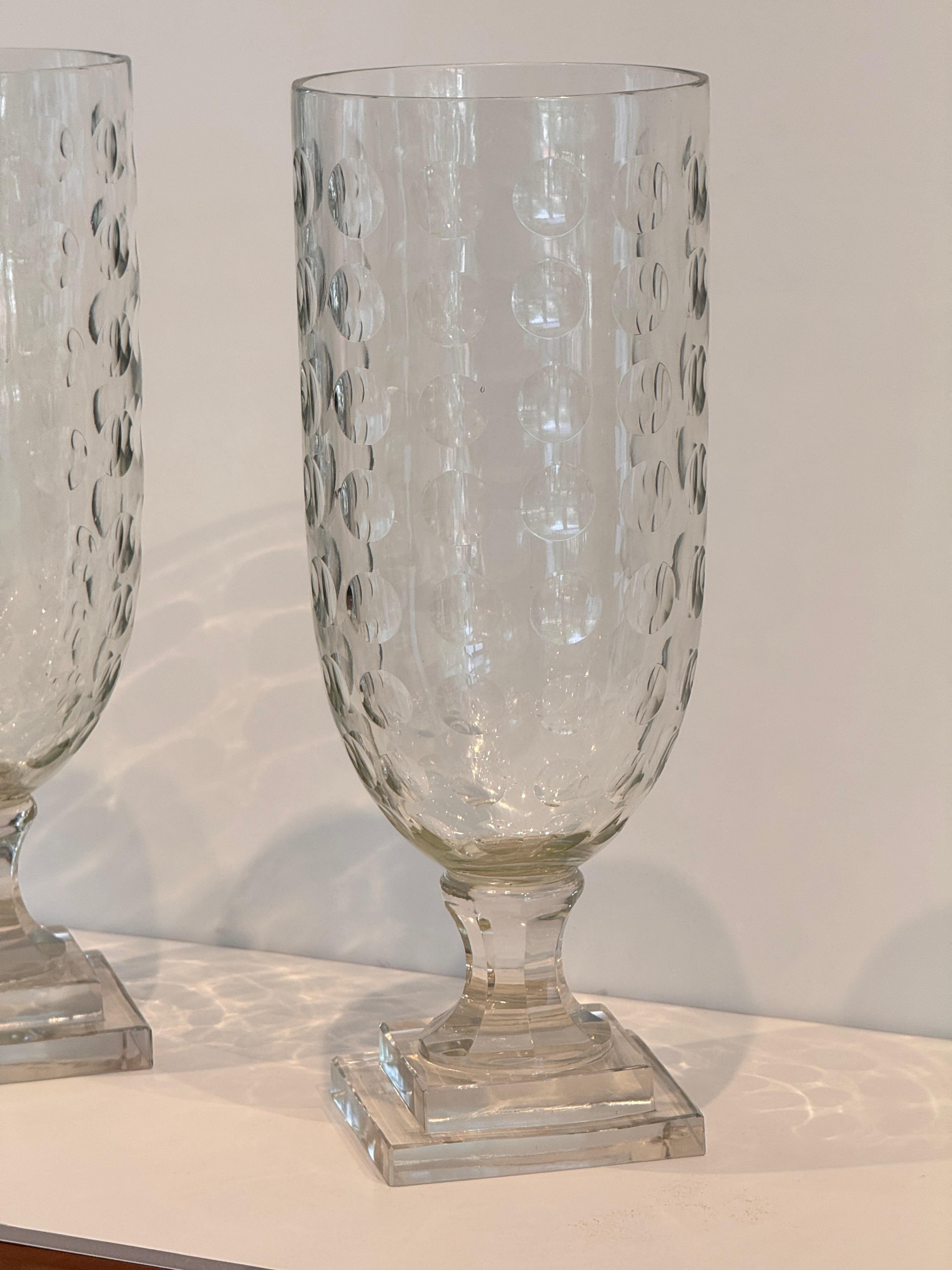Pair of Egg-Cut Glass Urns on Tiered Bases In Good Condition For Sale In Charlottesville, VA
