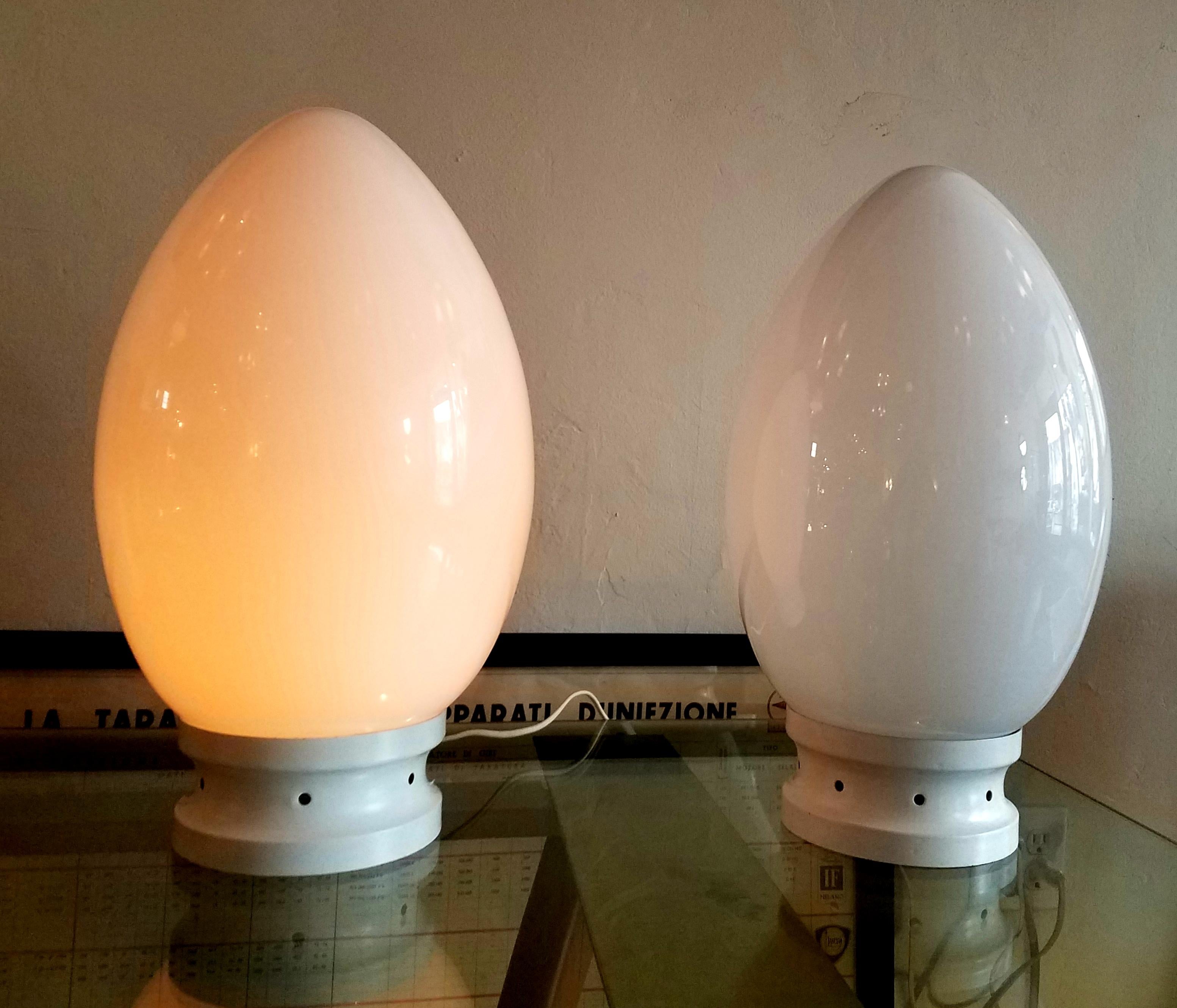 Italian 1970s pair of Egg glass lamps by Fontana Arte. 
please note, each item can be sold separately- price per  Lamp is $1100