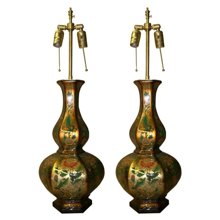 Pair of Eglomise vases with lamp application. For Sale