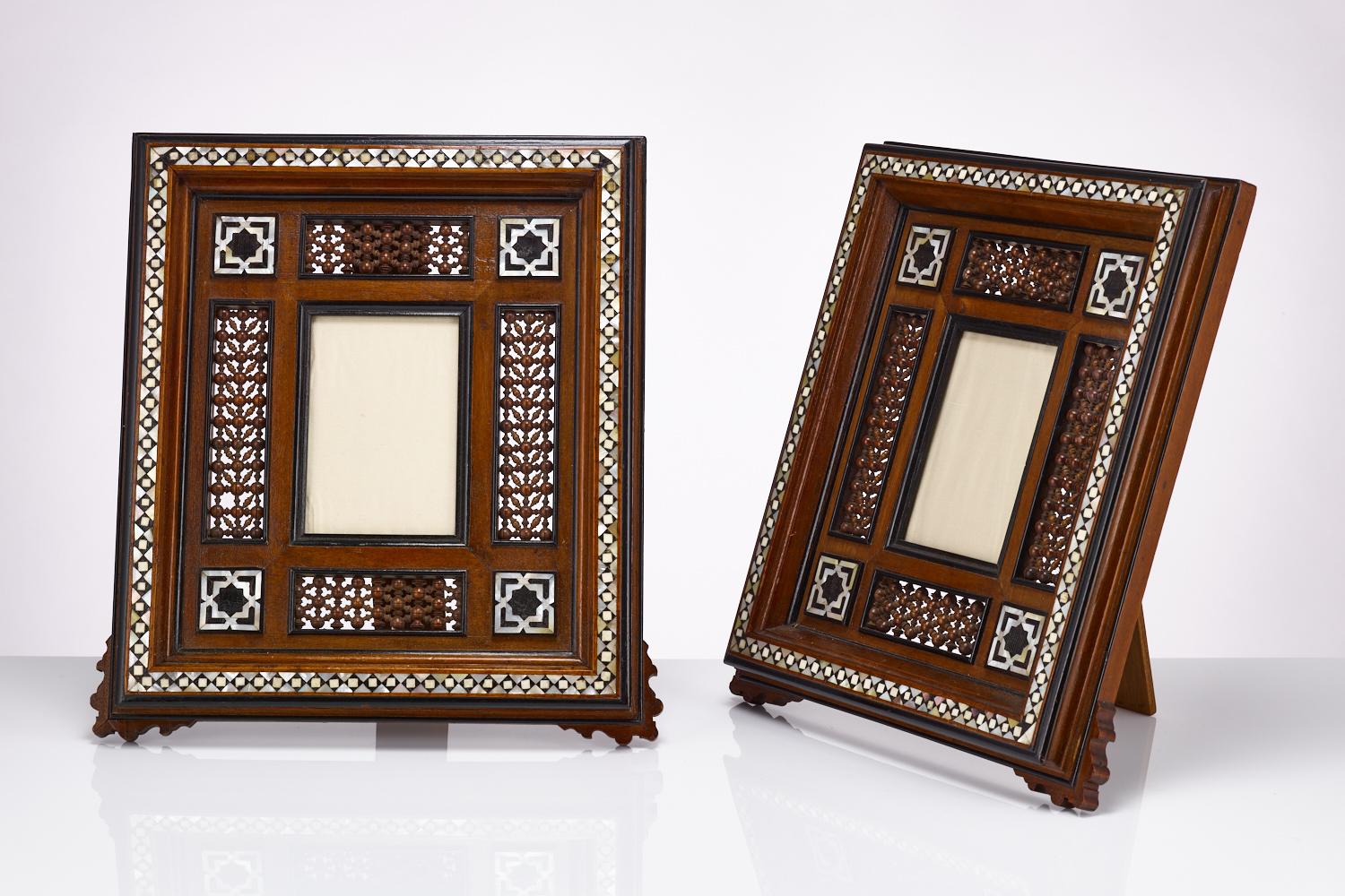 Pair of Egyptian 20th century Middle Eastern Moorish photo frames with superb quality mother-of-pearl decoration. 

Date circa 1910.

These frames are in excellent condition.